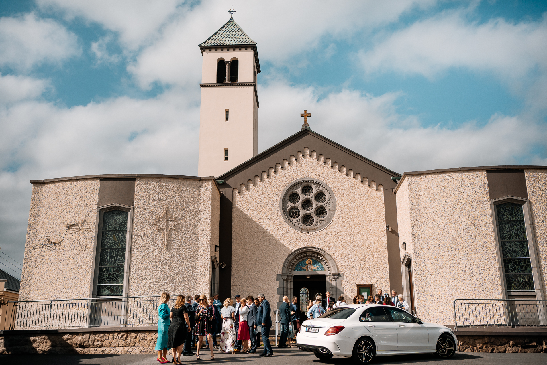 A group of people outside of a church