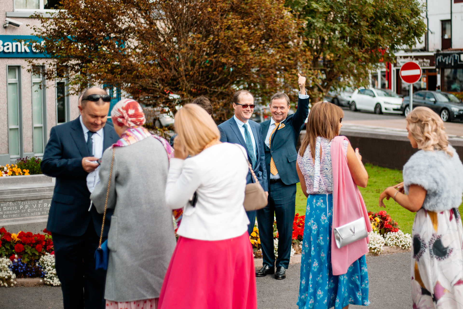 A group of people standing outside