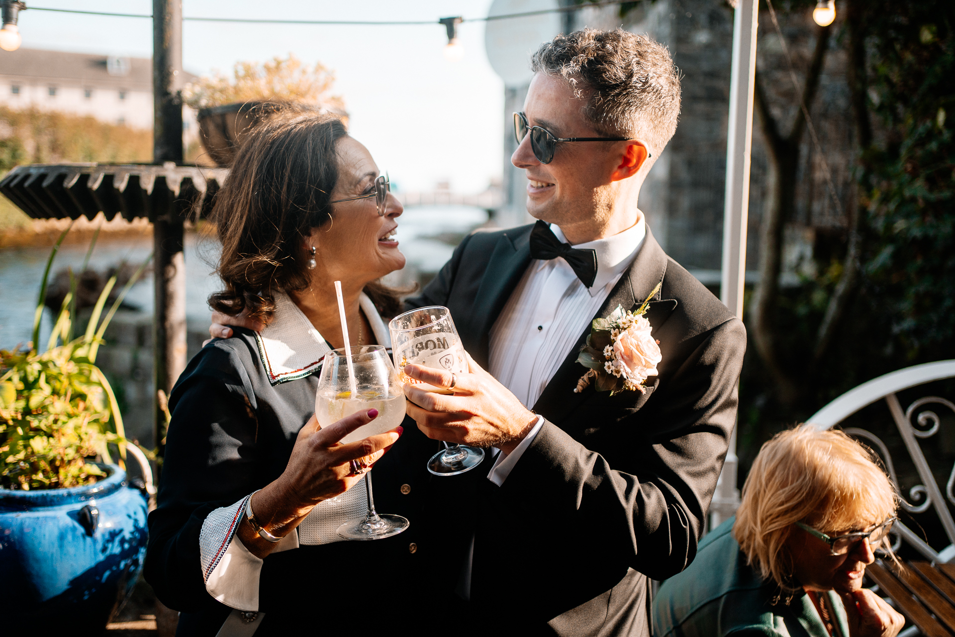 A man and woman holding wine glasses