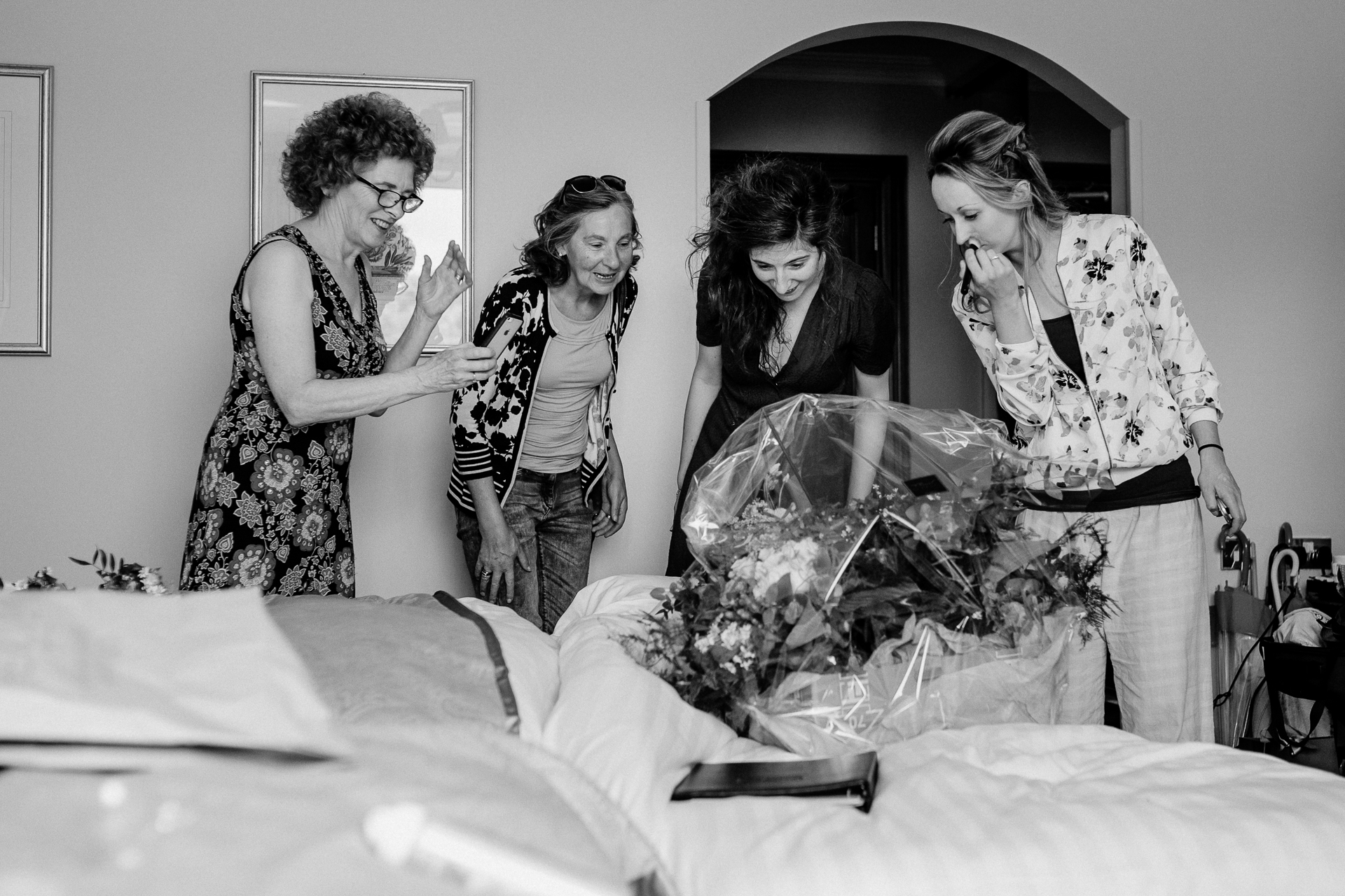 Bride and groom getting ready for their wedding at Glenlo Abbey Hotel in Galway, Ireland.