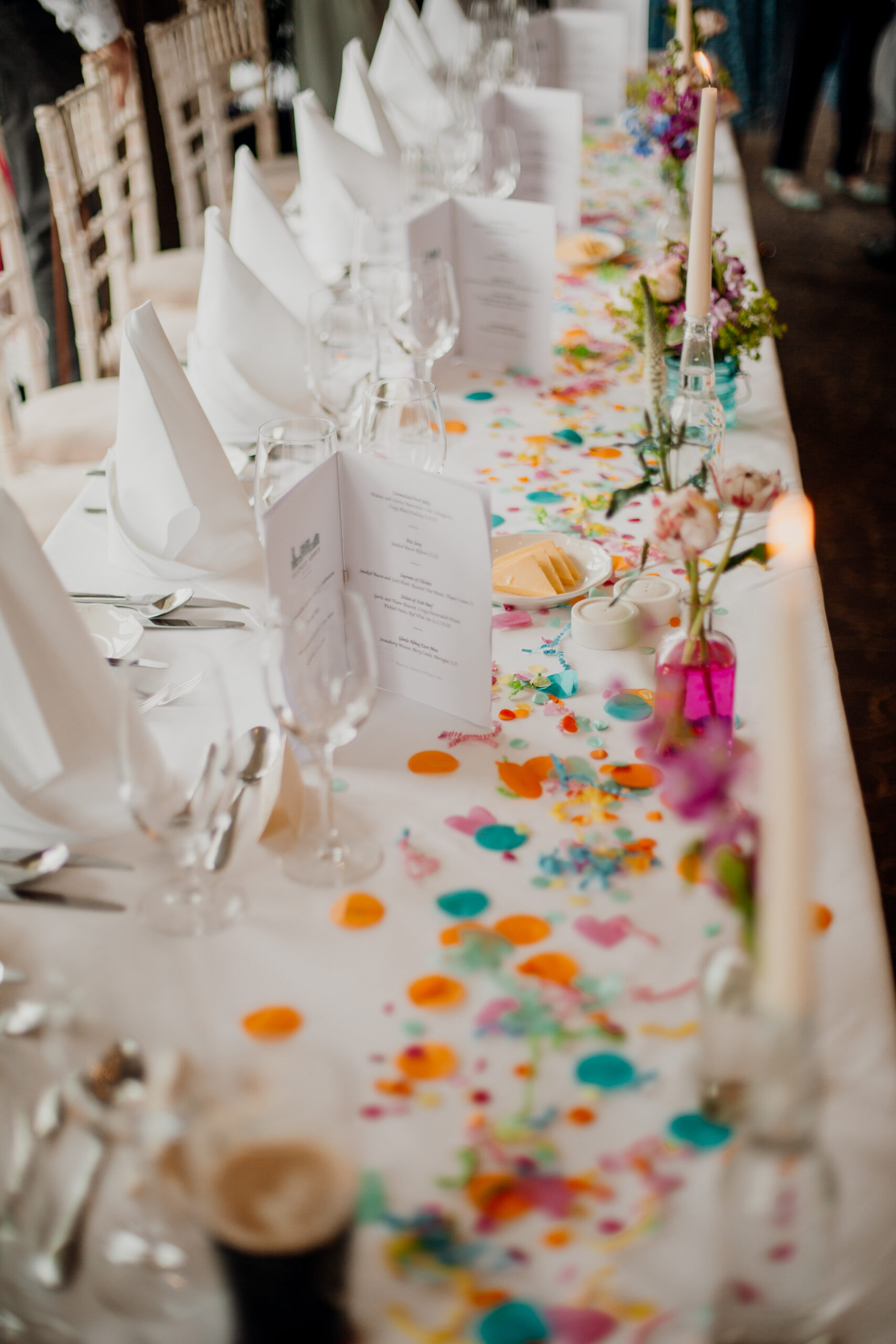 Bride and groom enjoying their wedding reception at Glenlo Abbey Hotel, surrounded by family and friends.