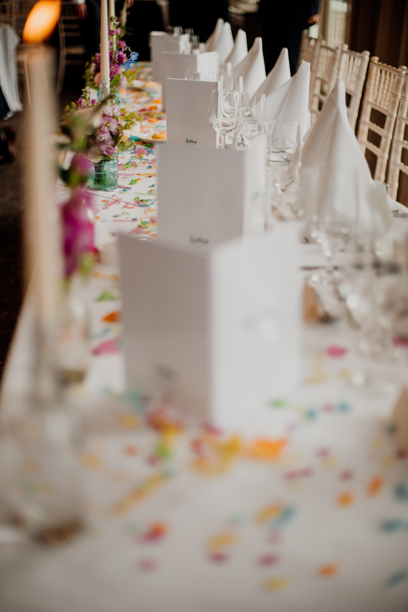 Bride and groom enjoying their wedding reception at Glenlo Abbey Hotel, surrounded by family and friends.