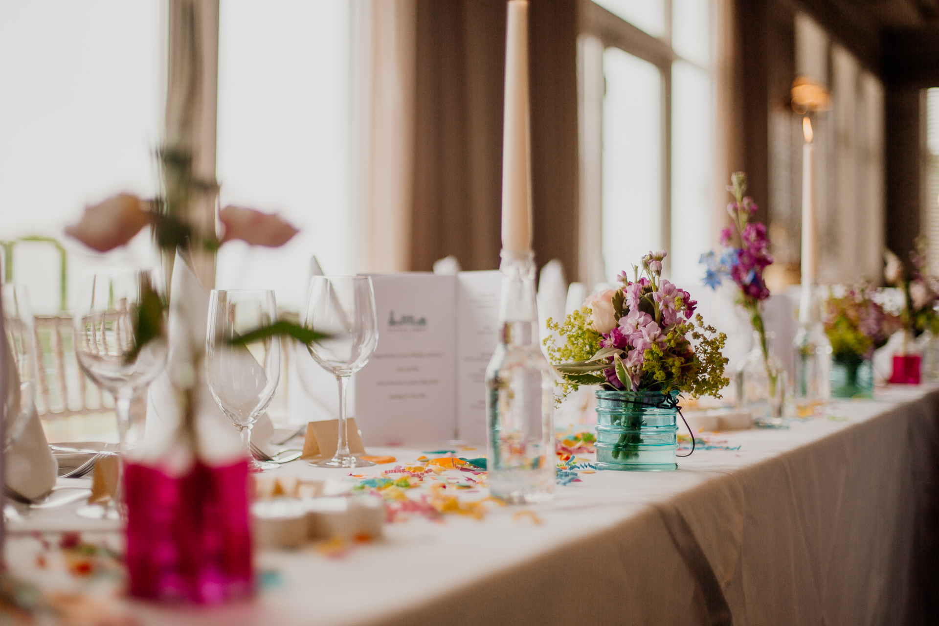 Bride and groom enjoying their wedding reception at Glenlo Abbey Hotel, surrounded by family and friends.