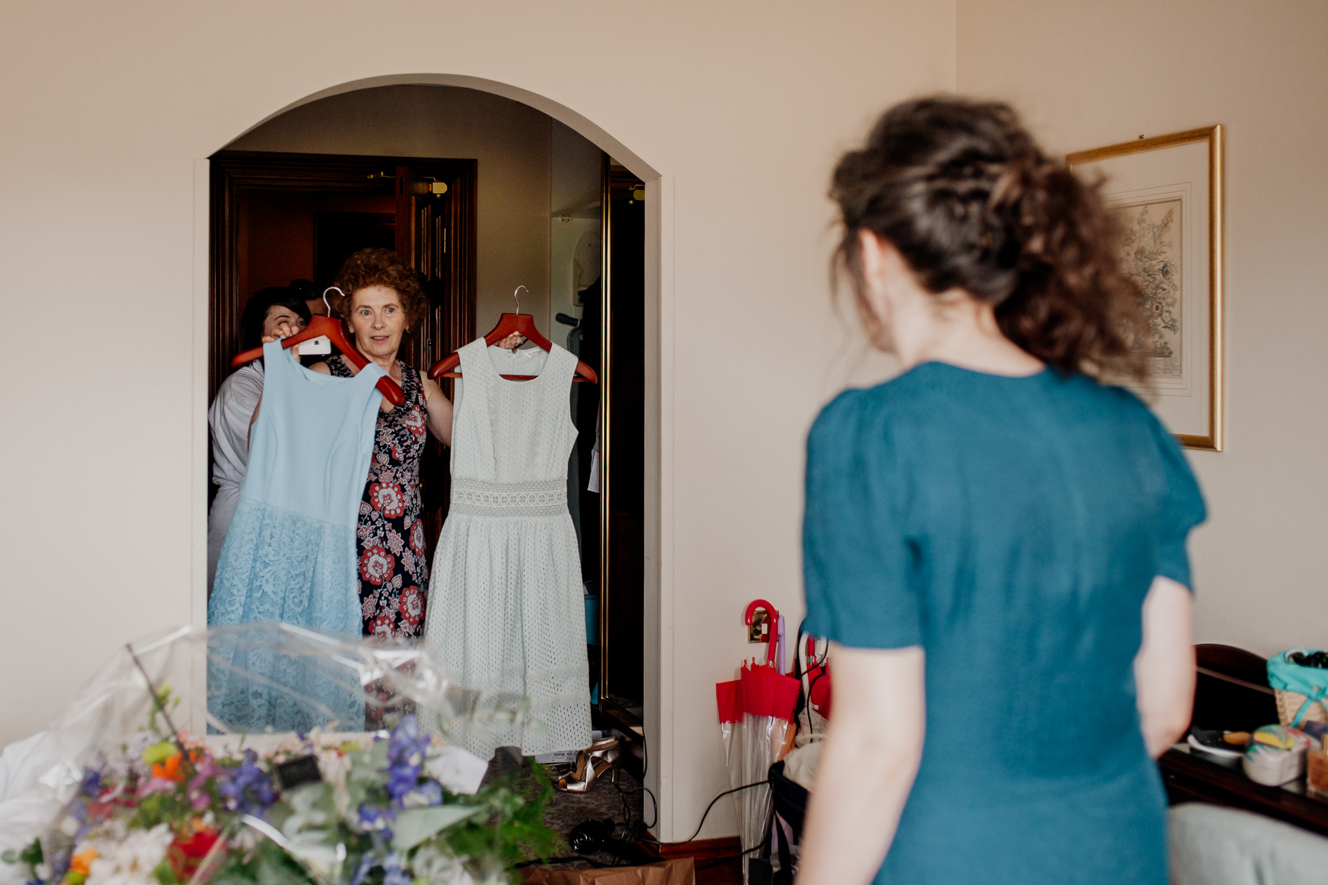 Bride and groom getting ready for their wedding at Glenlo Abbey Hotel in Galway, Ireland.