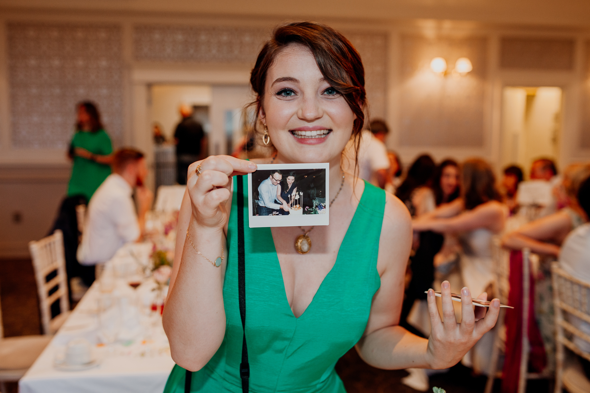 Bride and groom enjoying their wedding reception at Glenlo Abbey Hotel, surrounded by family and friends.