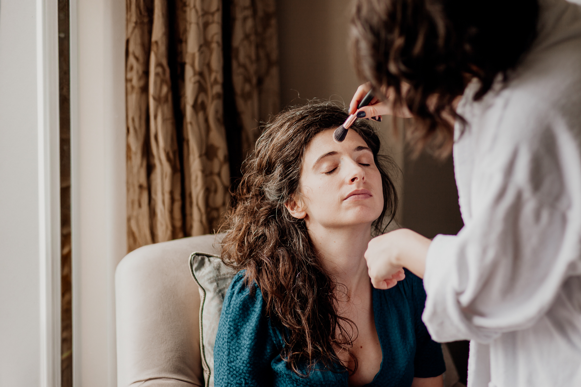 Bride and groom getting ready for their wedding at Glenlo Abbey Hotel in Galway, Ireland.