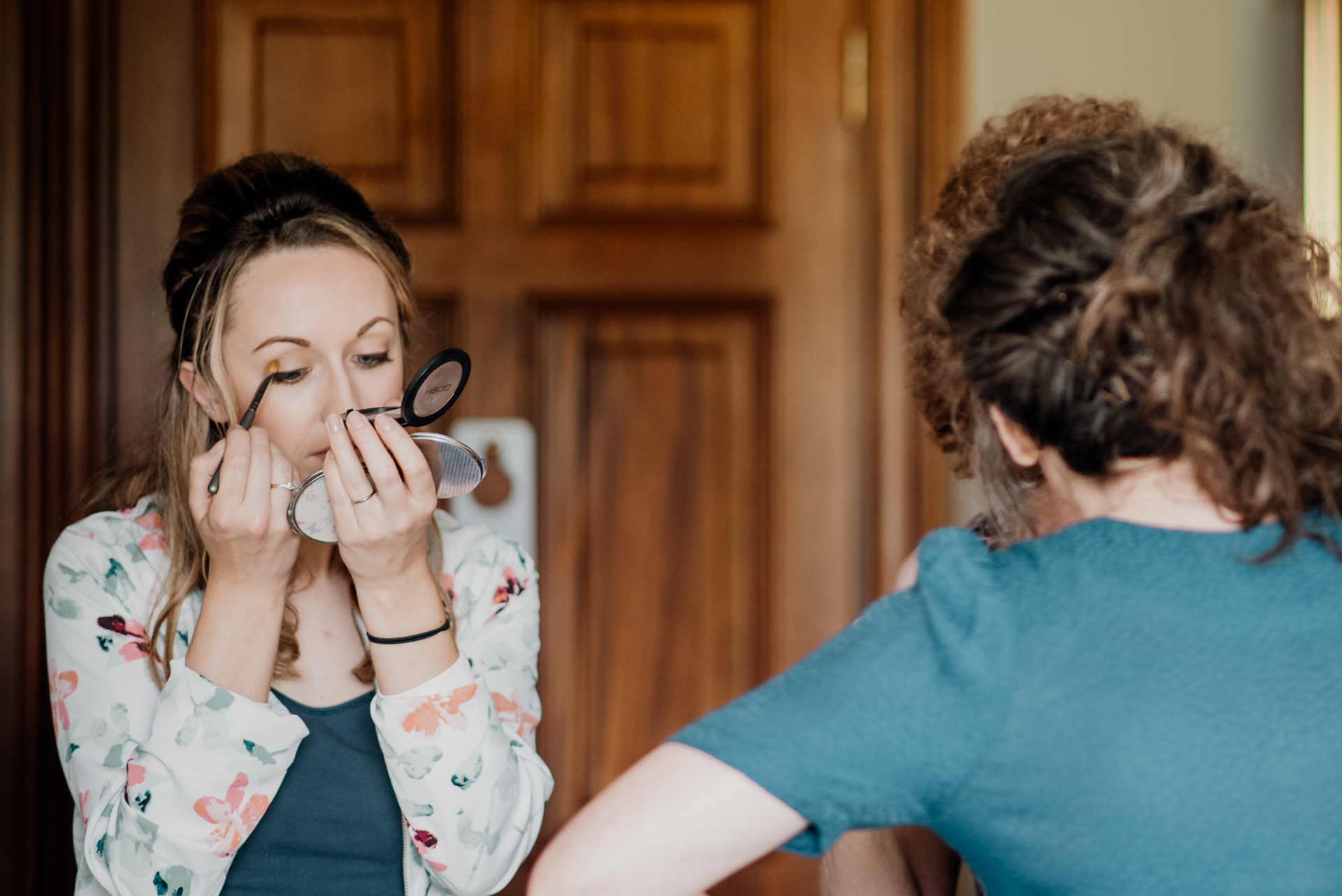 Bride and groom getting ready for their wedding at Glenlo Abbey Hotel in Galway, Ireland.