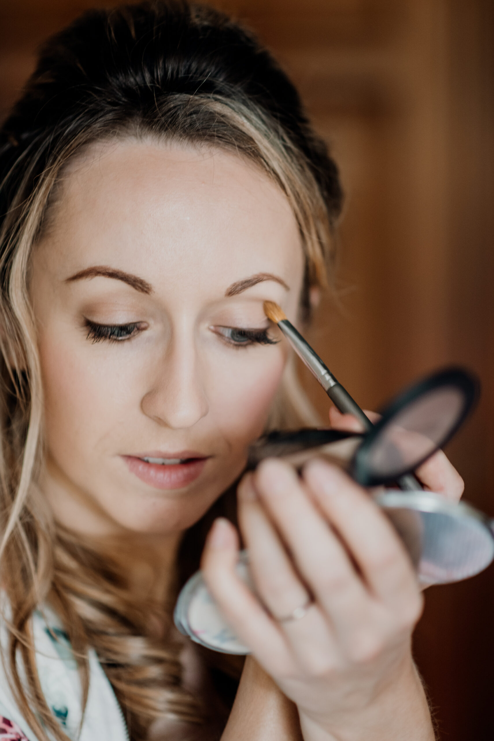 Bride and groom getting ready for their wedding at Glenlo Abbey Hotel in Galway, Ireland.