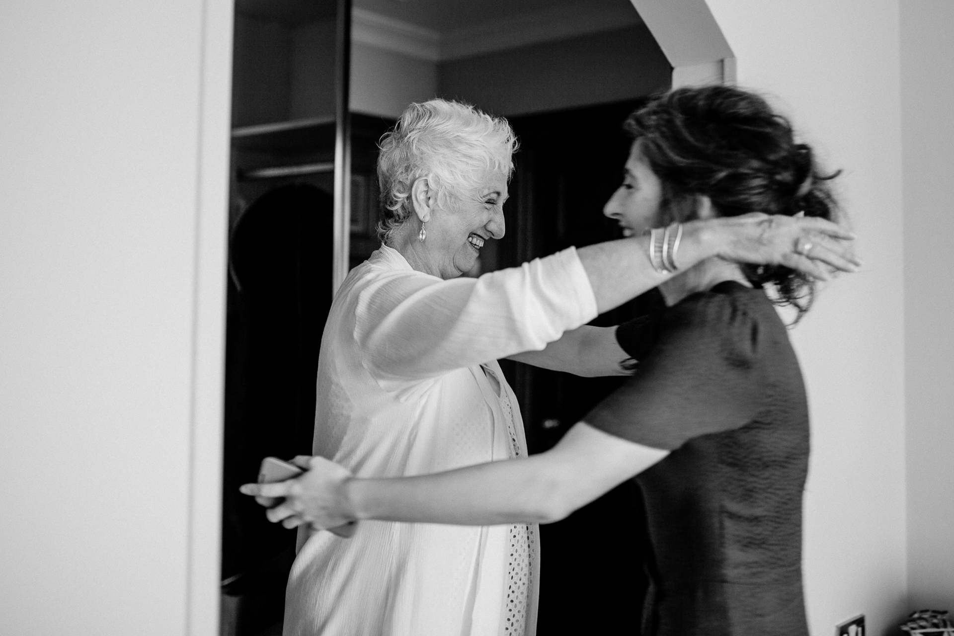 Bride and groom getting ready for their wedding at Glenlo Abbey Hotel in Galway, Ireland.