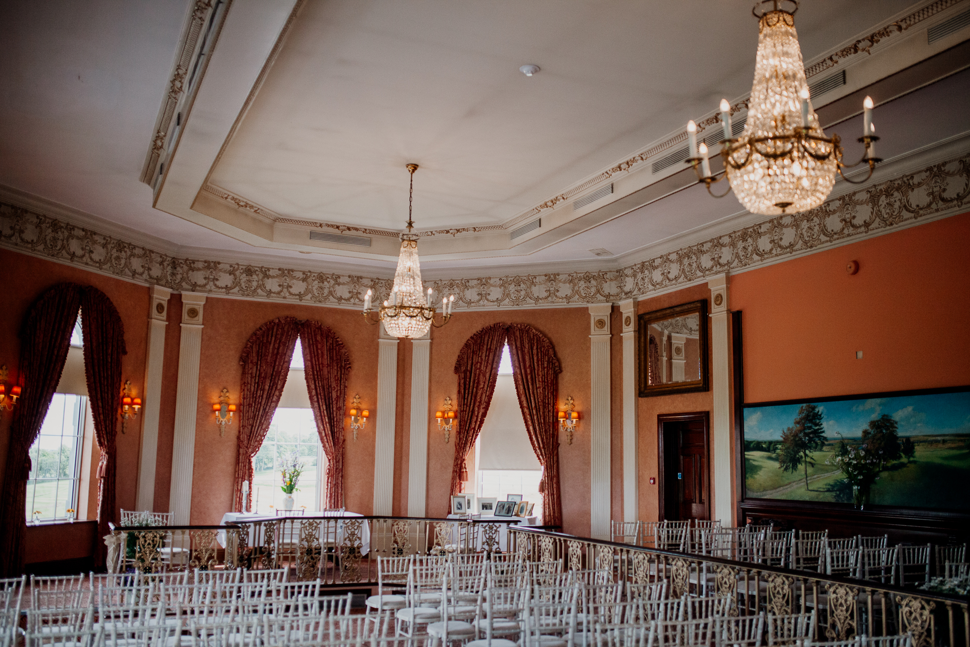 Bride and groom exchanging vows during their wedding ceremony at Glenlo Abbey Hotel, Galway.