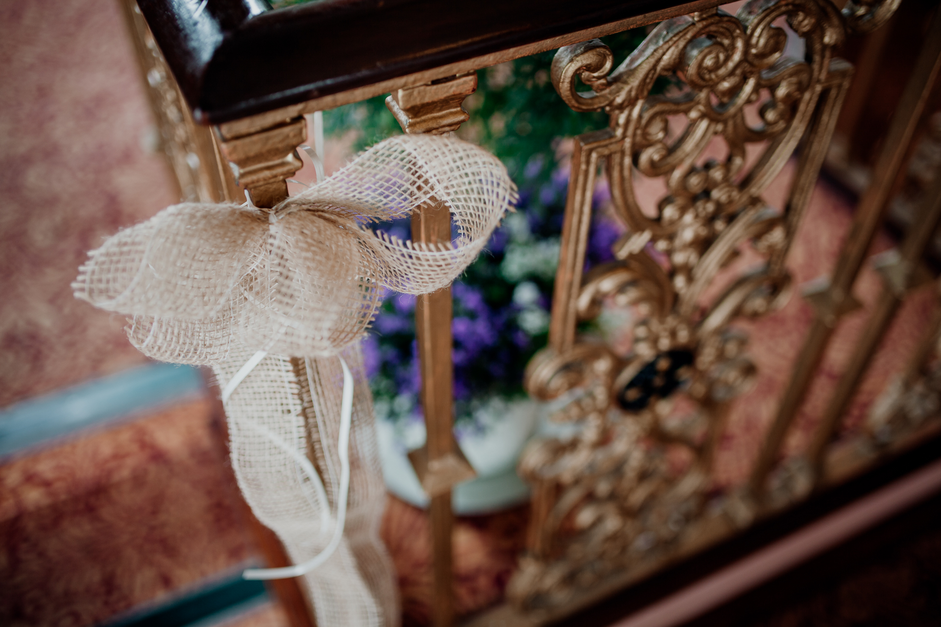 Bride and groom exchanging vows during their wedding ceremony at Glenlo Abbey Hotel, Galway.