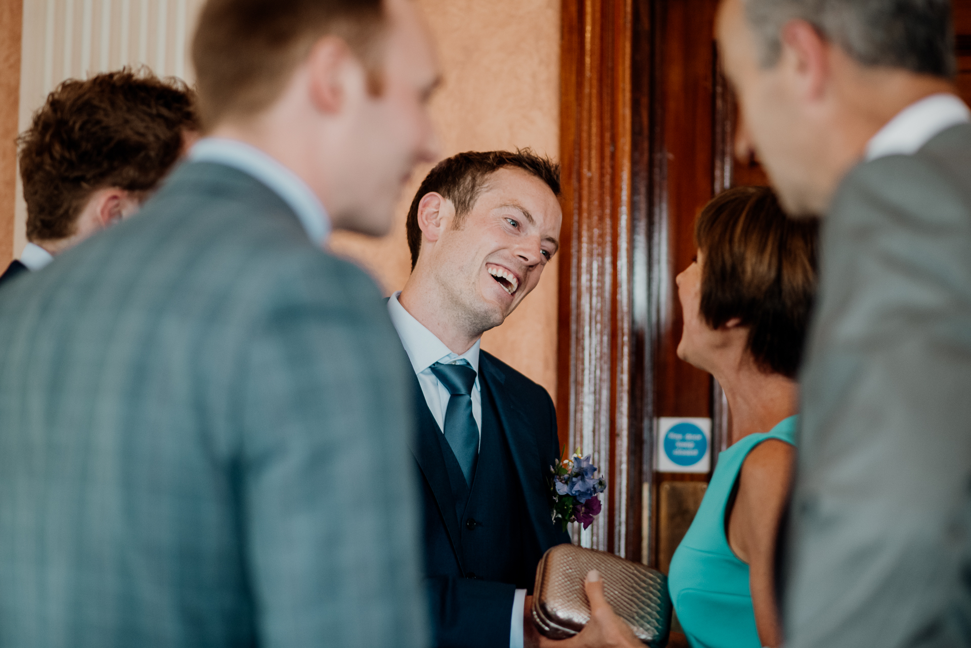 Bride and groom exchanging vows during their wedding ceremony at Glenlo Abbey Hotel, Galway.