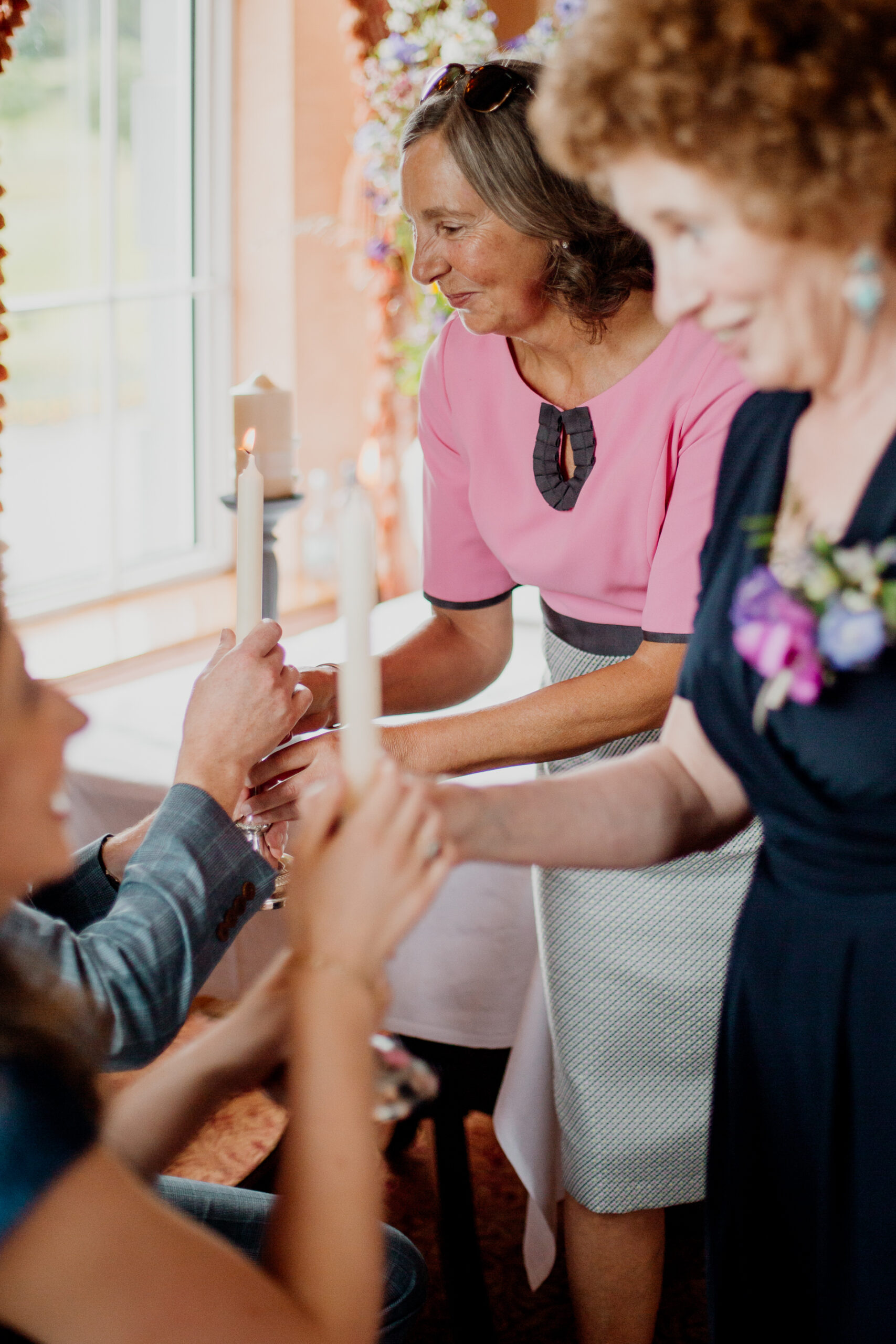 Bride and groom exchanging vows during their wedding ceremony at Glenlo Abbey Hotel, Galway.