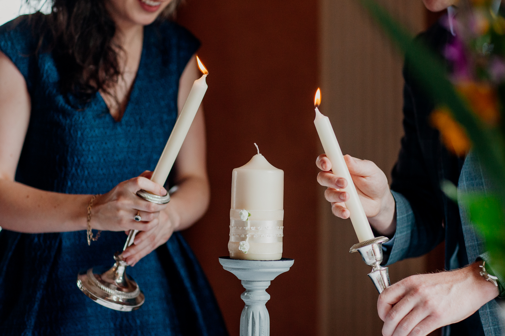 Bride and groom exchanging vows during their wedding ceremony at Glenlo Abbey Hotel, Galway.