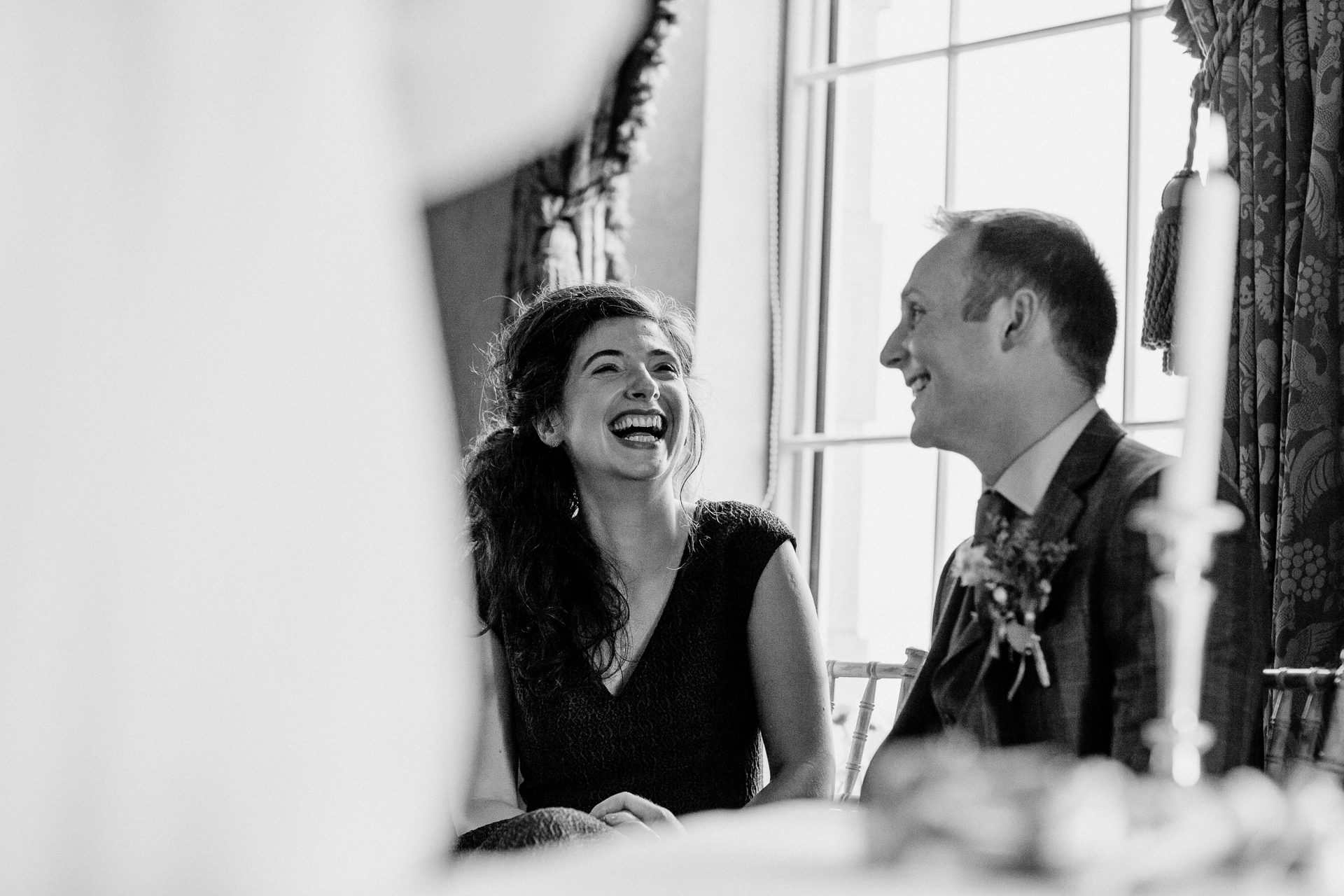 Bride and groom exchanging vows during their wedding ceremony at Glenlo Abbey Hotel, Galway.