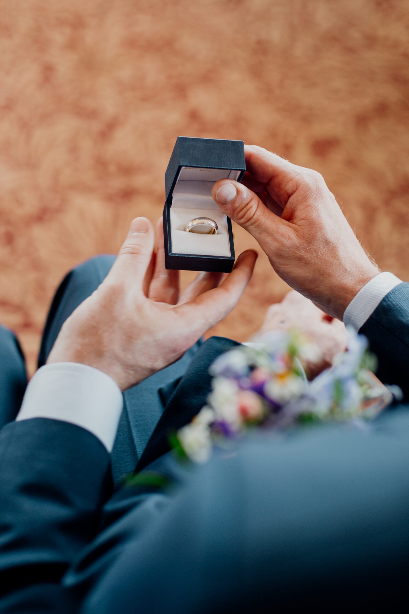 Bride and groom exchanging vows during their wedding ceremony at Glenlo Abbey Hotel, Galway.