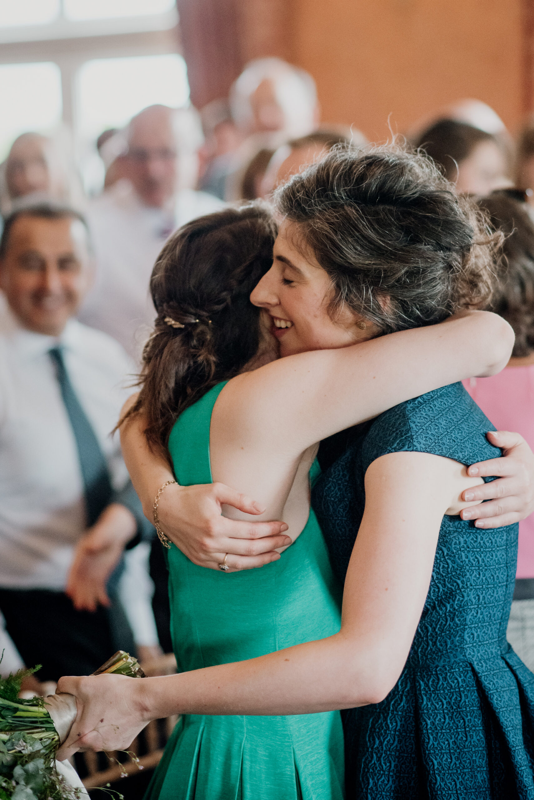 Bride and groom exchanging vows during their wedding ceremony at Glenlo Abbey Hotel, Galway.