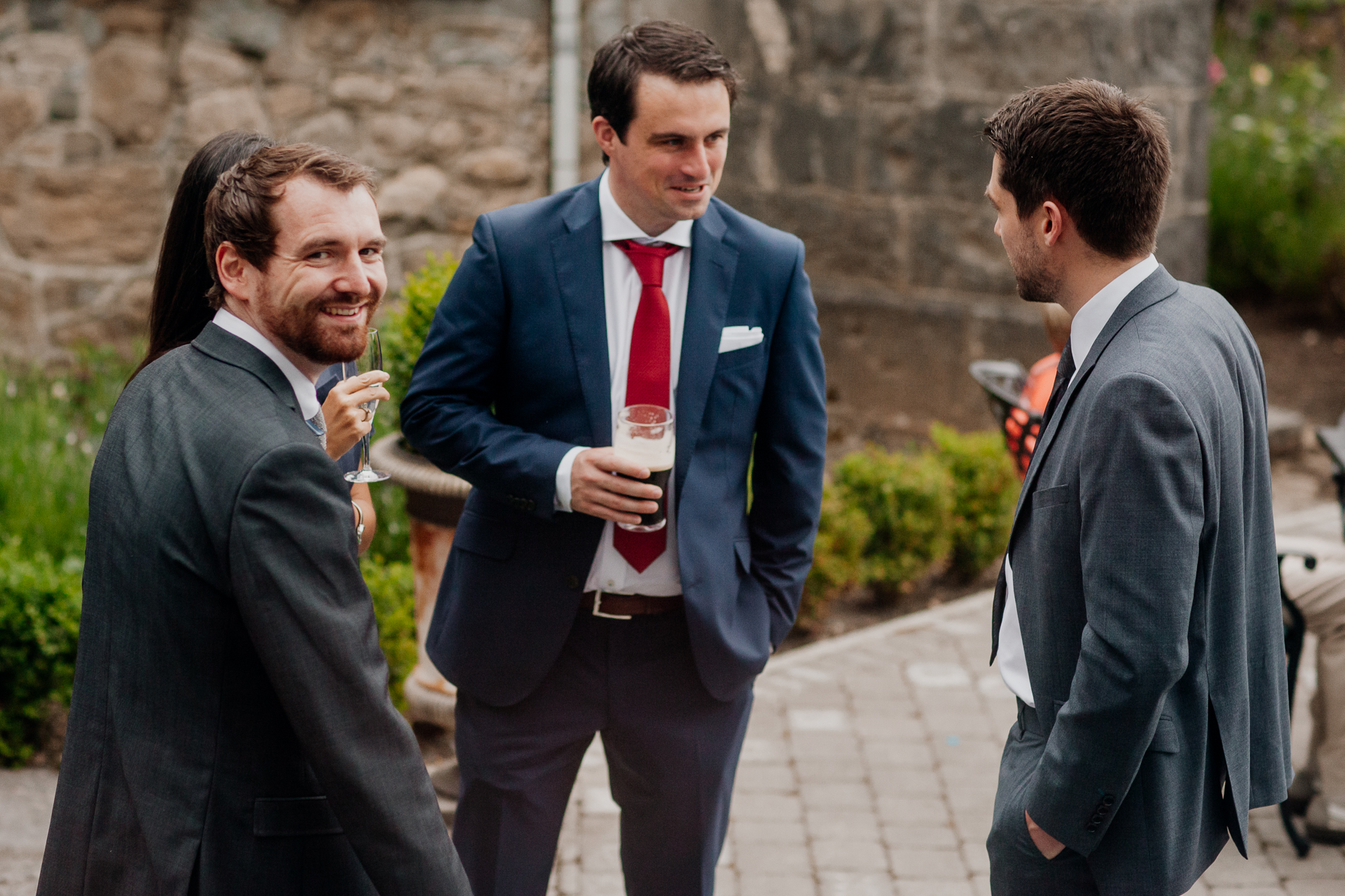 Bride and groom exchanging vows during their wedding ceremony at Glenlo Abbey Hotel, Galway.