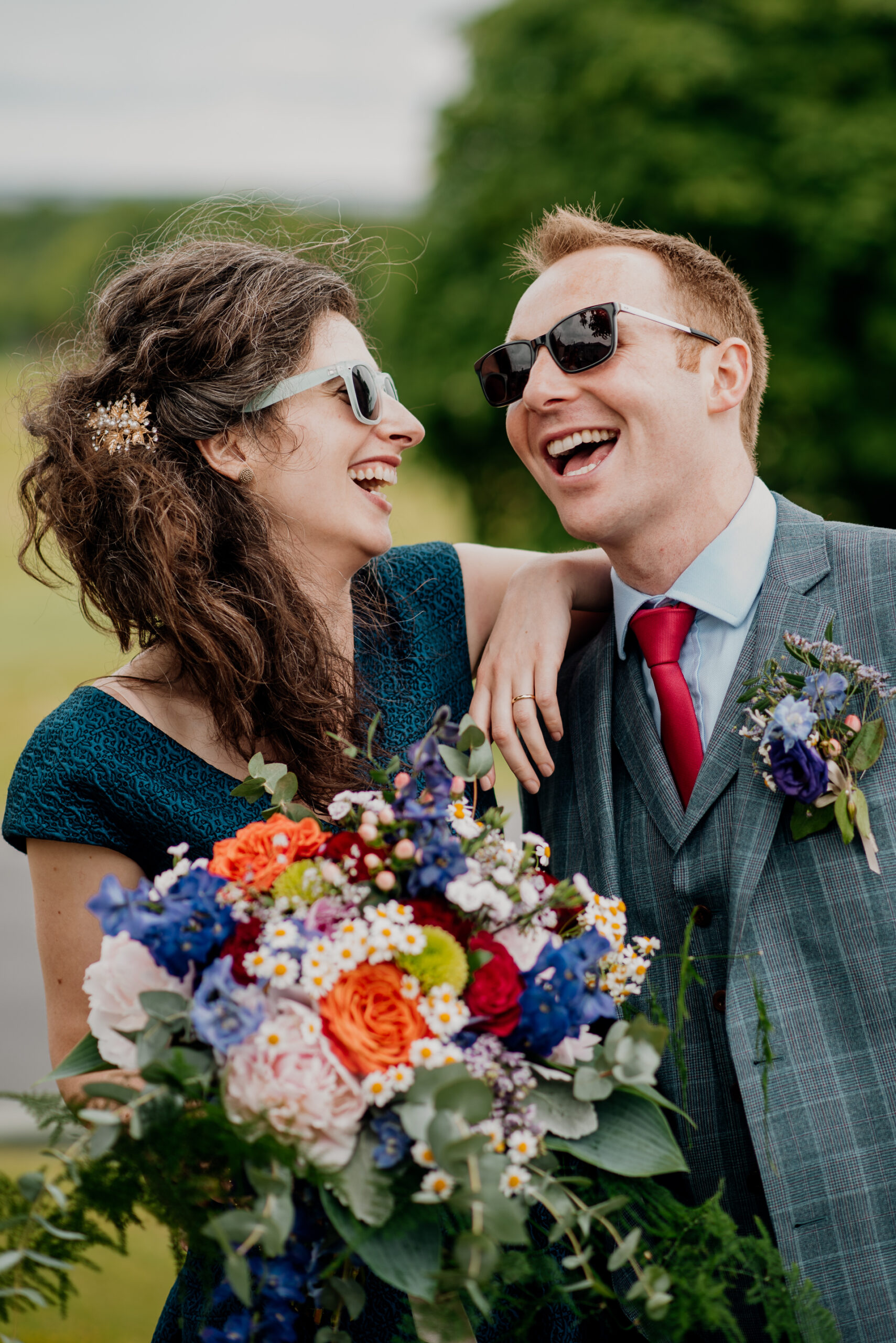 Bride and groom sharing an intimate moment during their outdoor wedding photoshoot at Glenlo Abbey Hotel, Galway.