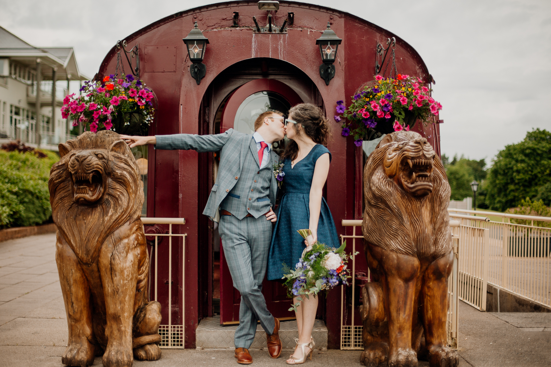 Bride and groom sharing an intimate moment during their outdoor wedding photoshoot at Glenlo Abbey Hotel, Galway.