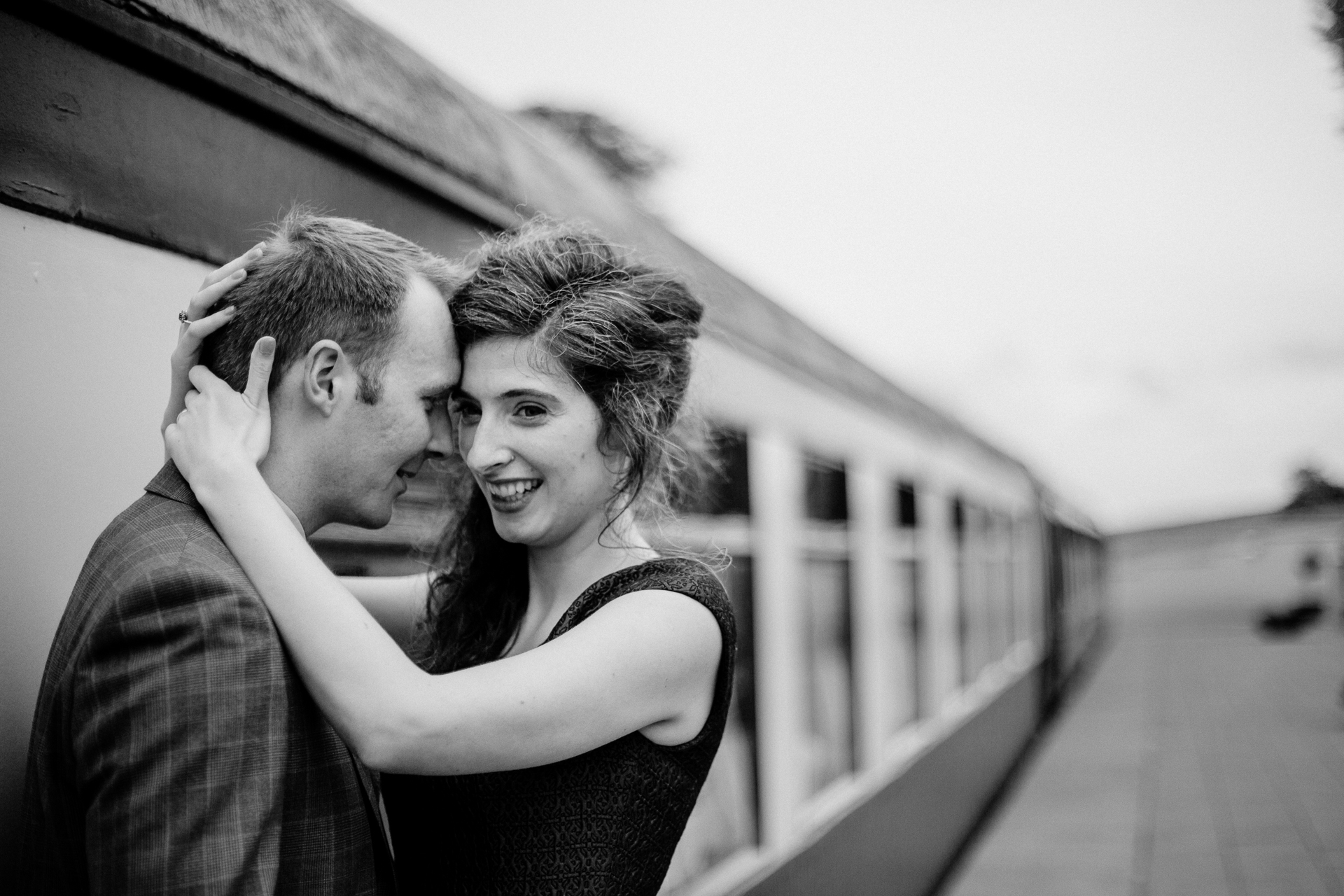 Bride and groom sharing an intimate moment during their outdoor wedding photoshoot at Glenlo Abbey Hotel, Galway.