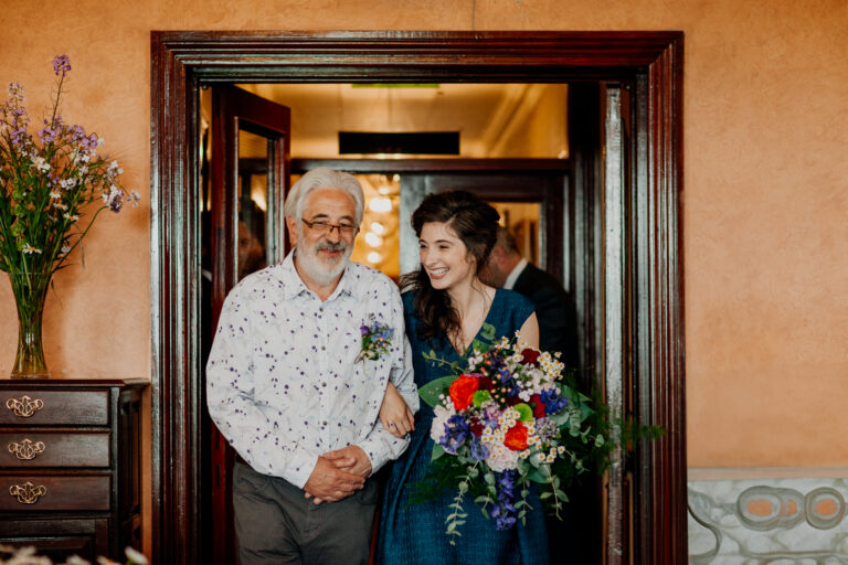 Bride and father sharing a heartfelt moment before the ceremony at Glenlo Abbey Hotel in Galway