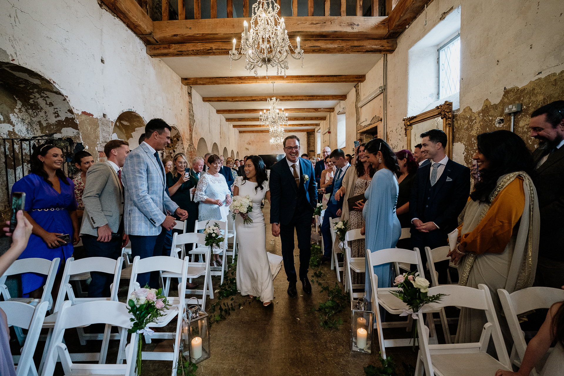 guests arriving for indoor wedding ceremony at belleek castle