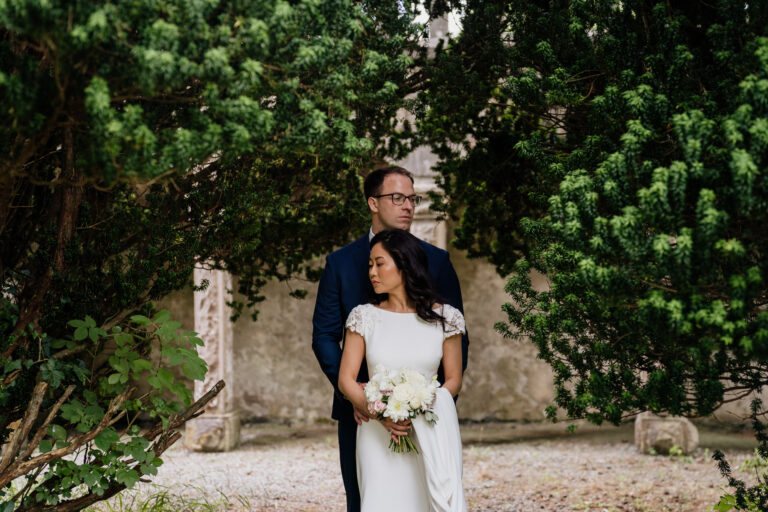 Bride and groom portrait in the forest garden at Belleek Castle – captured by a Dublin Wedding Photographer during an intimate elopement.