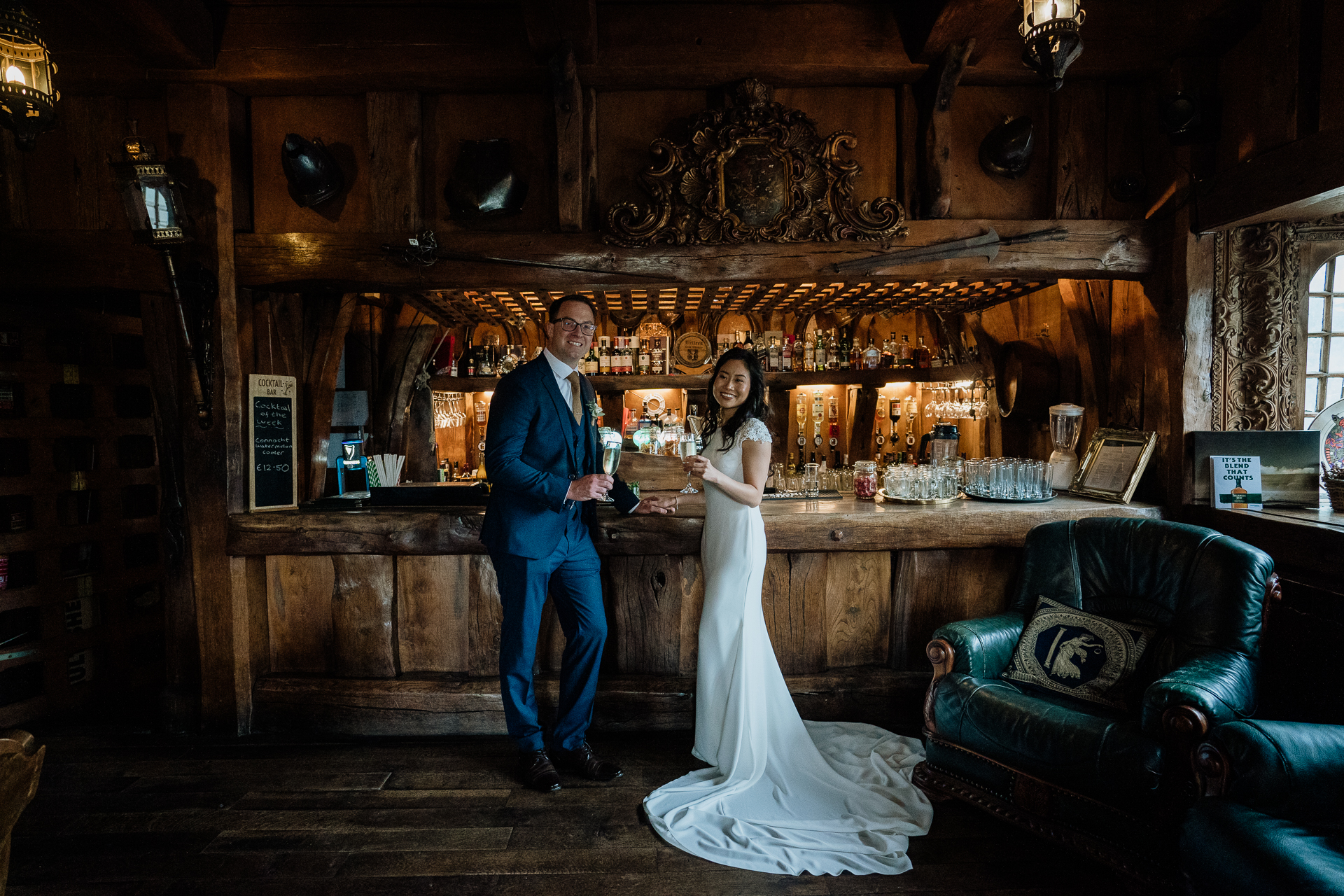 Bride and groom enjoying a quiet drink at the bar inside Belleek Castle