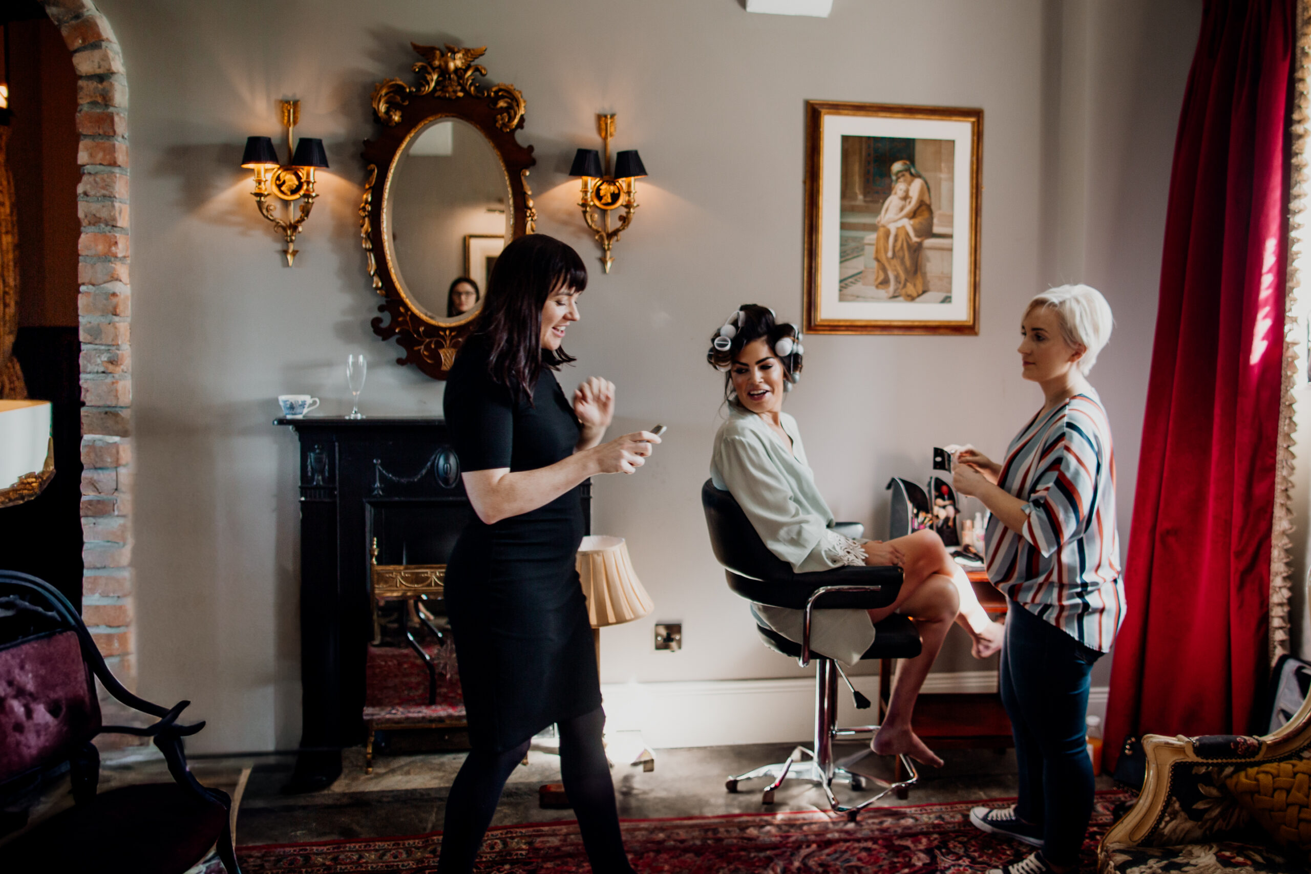 Bride getting her hair styled in the Butler’s Room – Markree Castle Wedding Preparations