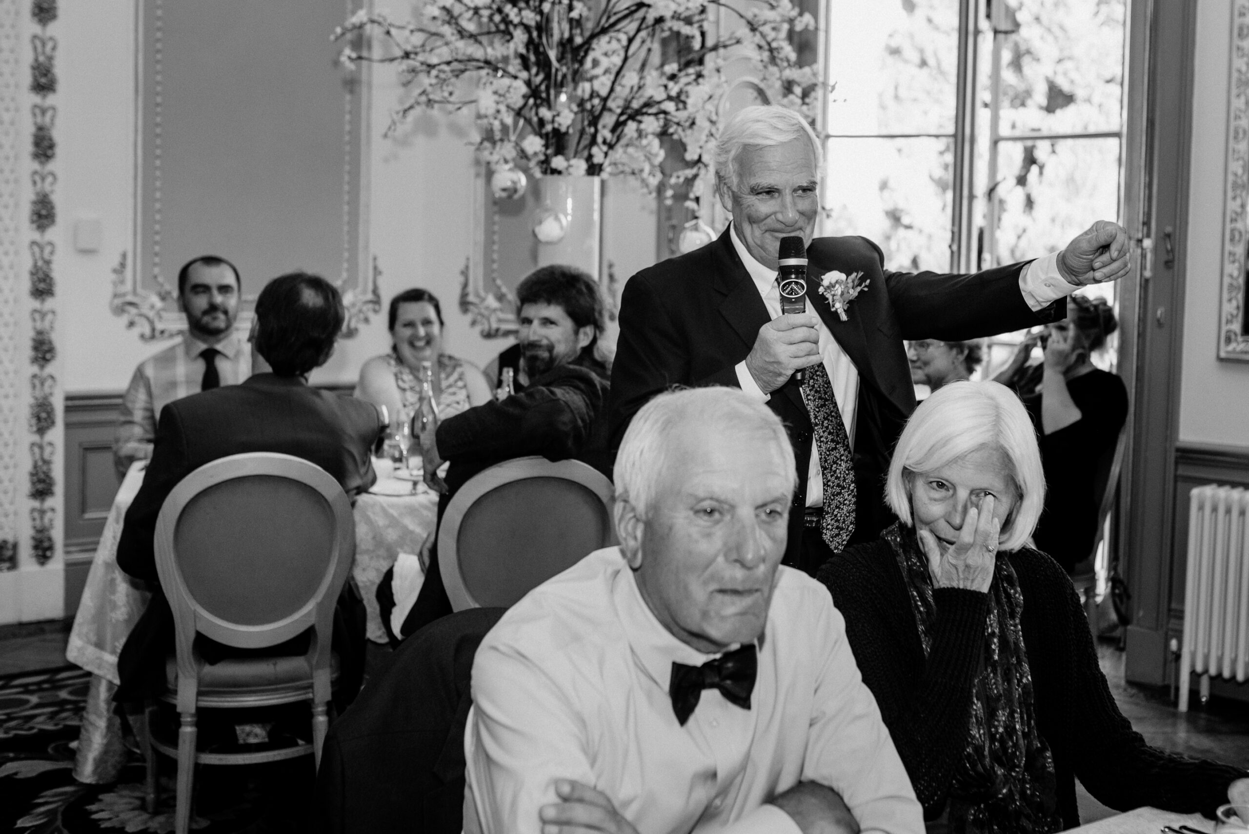 Candid wedding speech at Markree Castle – a guest giving a toast during reception in the castle’s elegant dining room