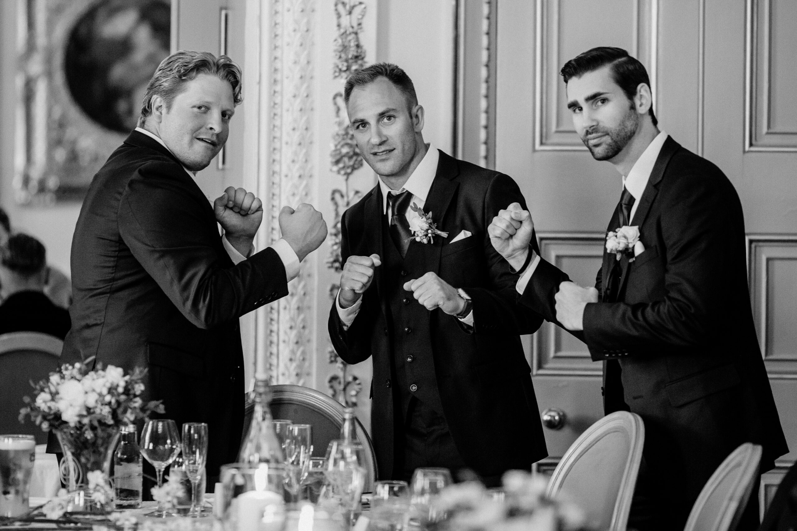 Groomsmen giving a toast during the wedding speeches at Markree Castle in Ireland