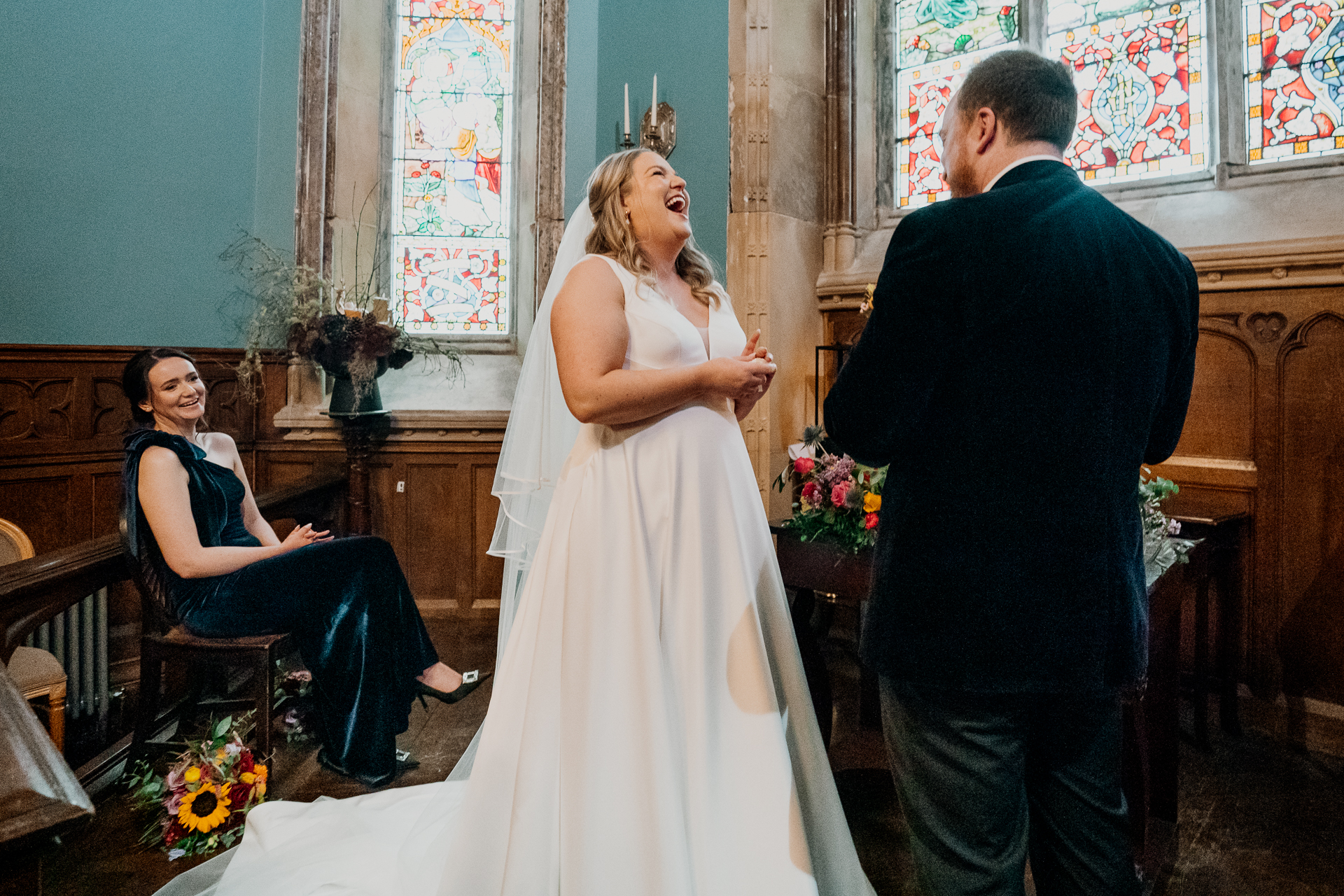 Bride and groom exchanging vows during a wedding ceremony in the chapel at Markree Castle