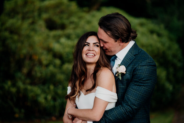 Candid close-up portrait of the bride and groom smiling during their Markree Castle Wedding