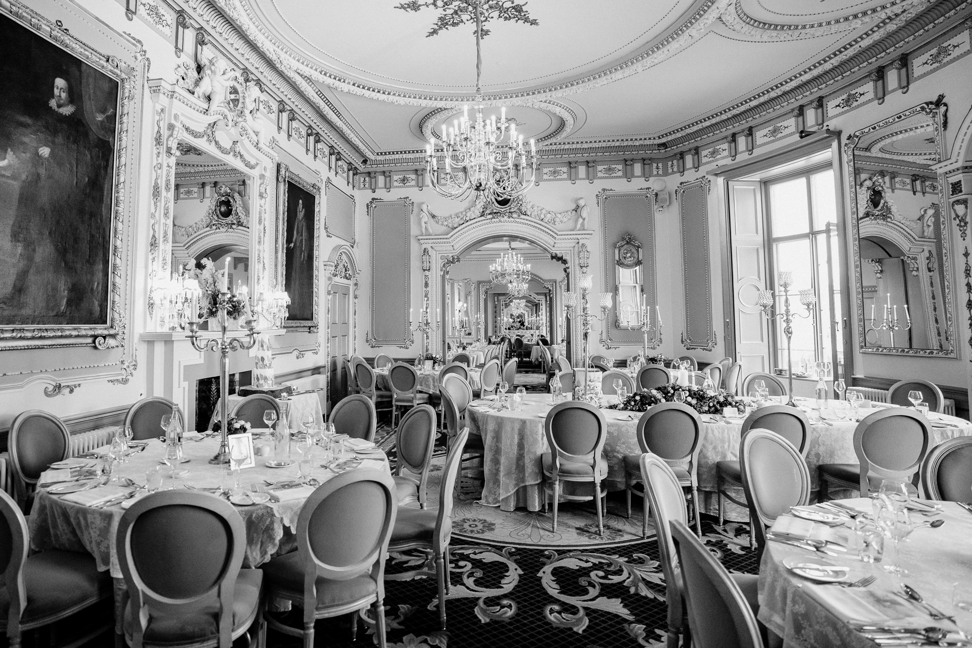 Elegant wedding dining setup inside Markree Castle – luxury interior of the reception space.