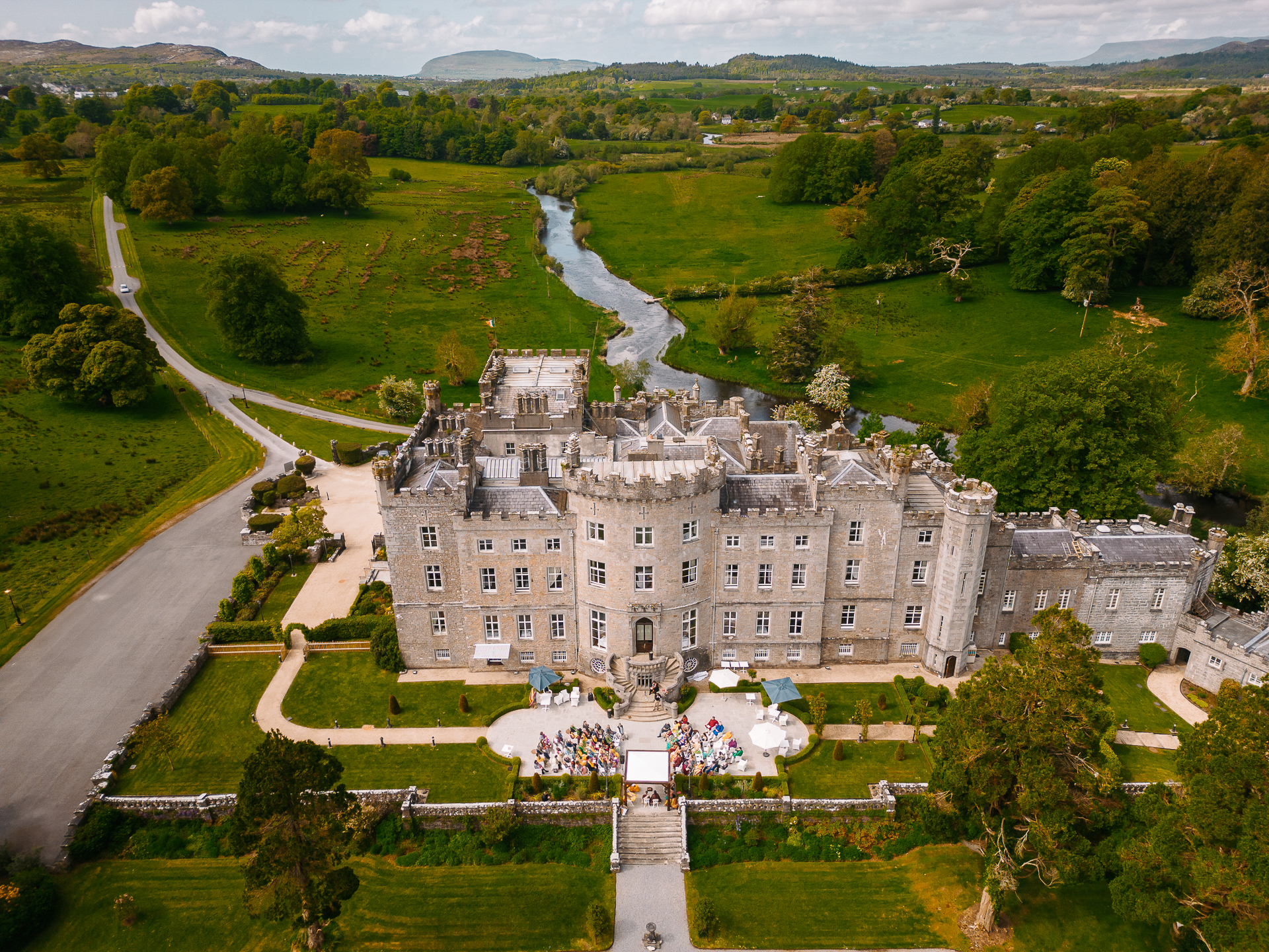Aerial view of Markree Castle and the outdoor Indian wedding ceremony setup in the gardens