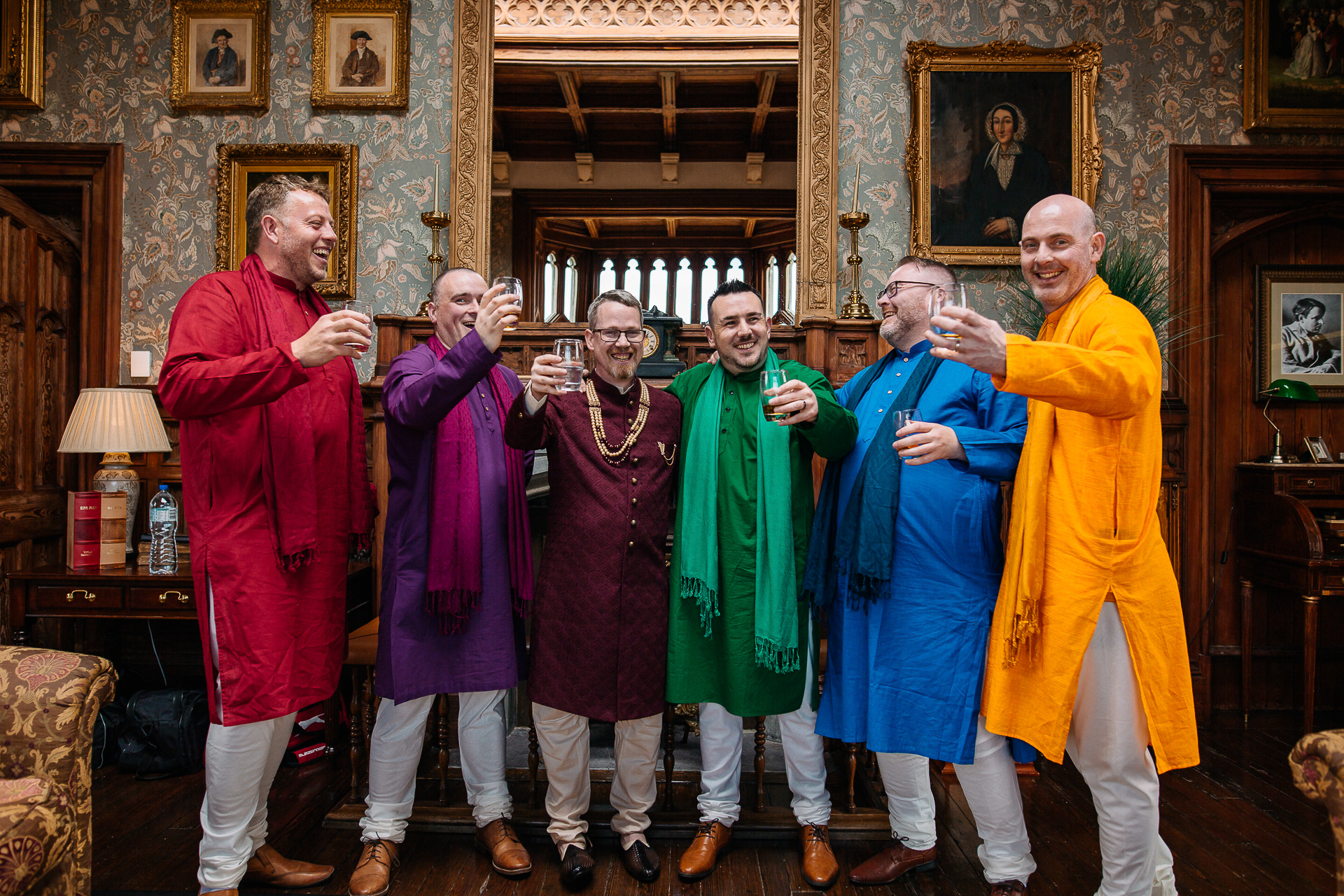 Groomsmen in vibrant traditional kurtas laughing together during an Indian wedding at Markree Castle