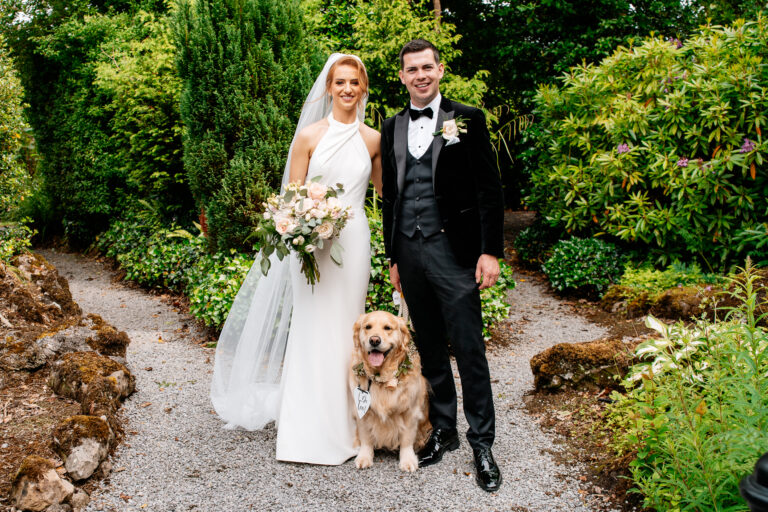 Bride and groom with their Golden Retriever at Markree Castle wedding in Ireland – captured by Destination Wedding Photographer Wojciech Koza.