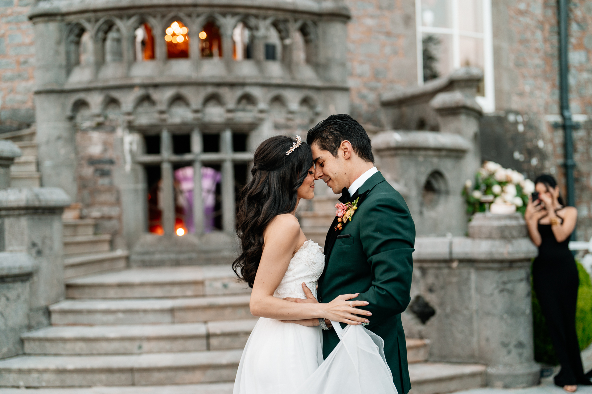 Bride and groom sharing a first dance on the steps of Markree Castle’s garden terrace during their wedding

