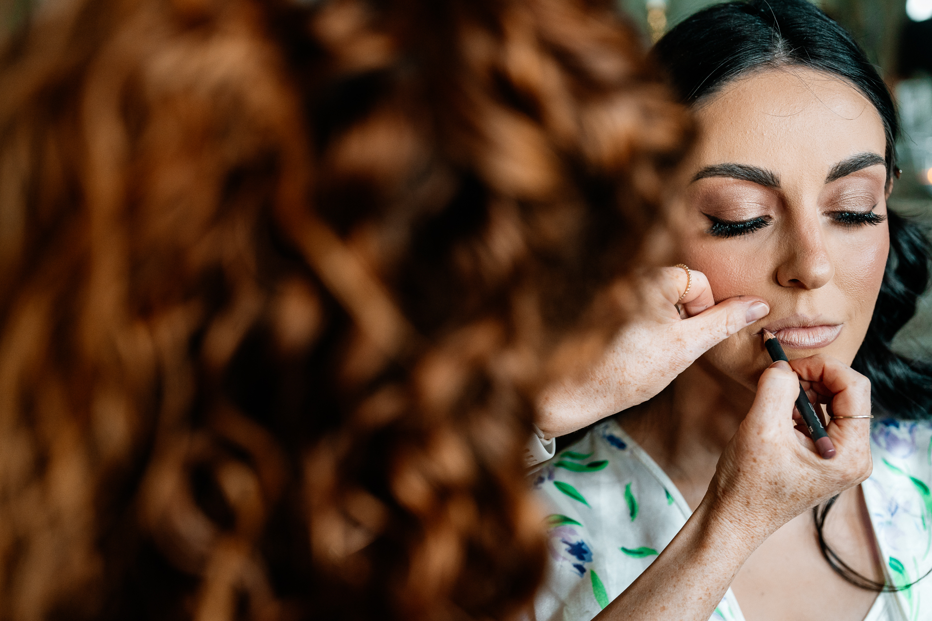 Bride getting ready in the light-filled bridal suite at Markree Castle