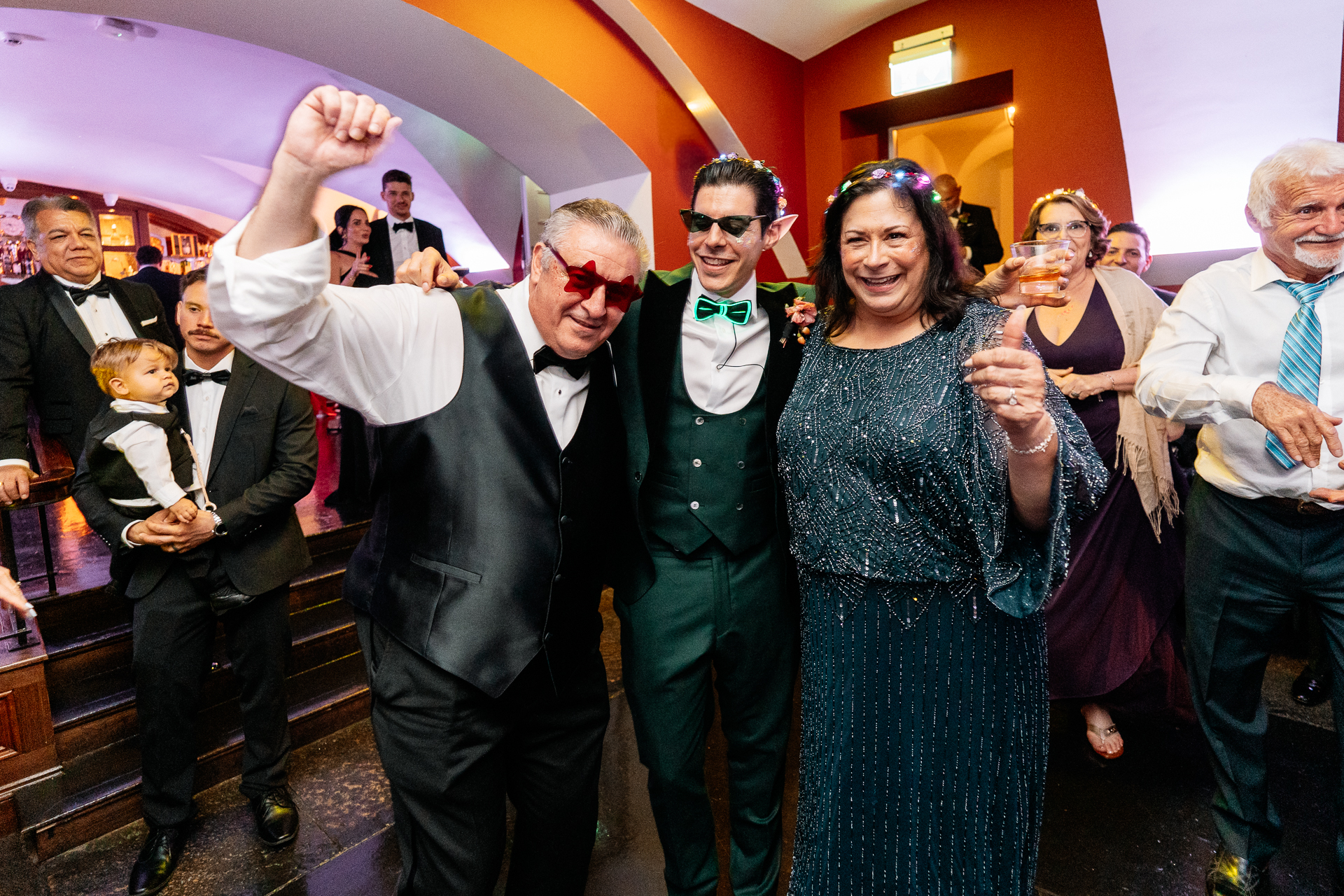 Wedding guests dancing on the indoor dance floor at Markree Castle during the evening reception