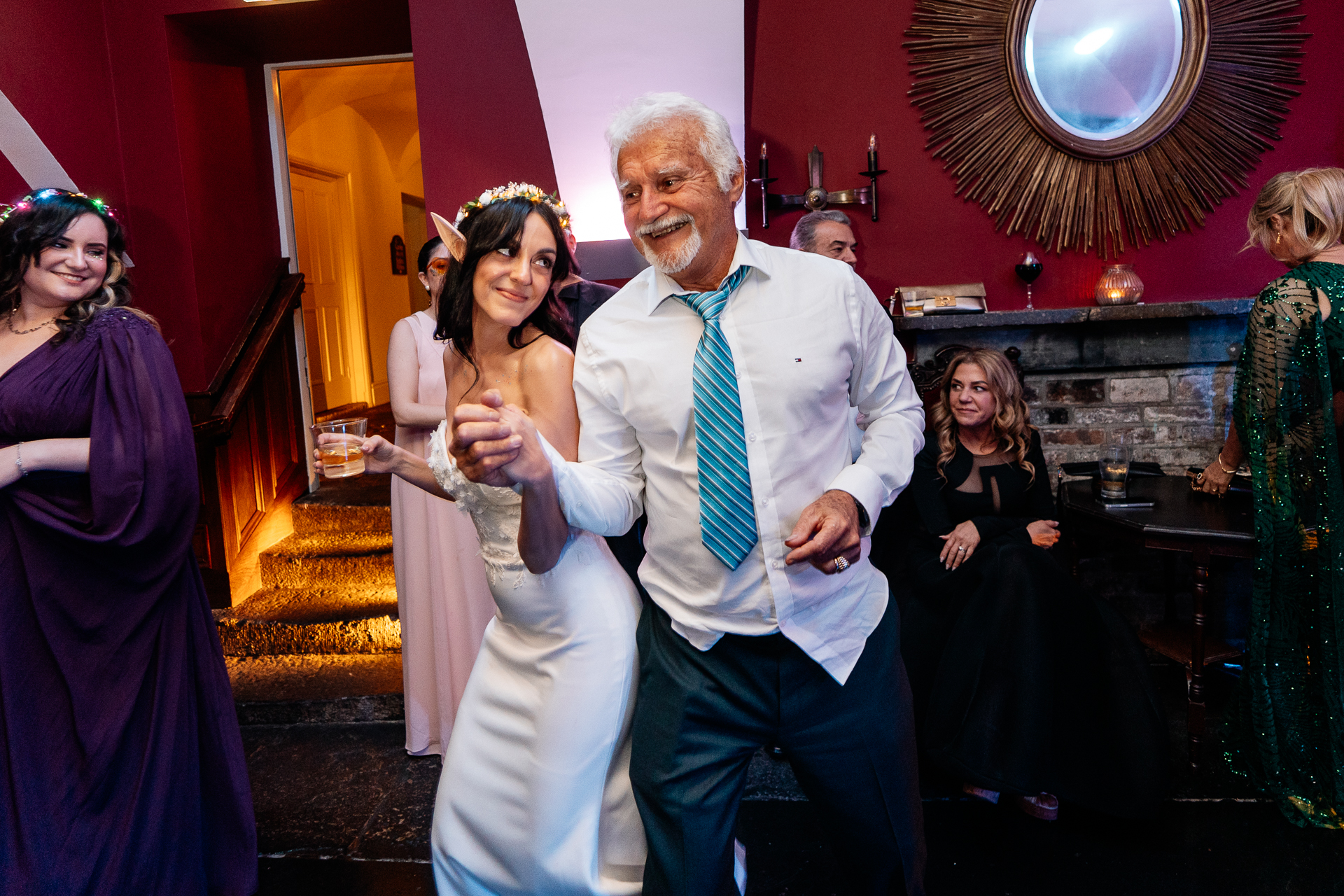 Wedding guests dancing on the indoor dance floor at Markree Castle during the evening reception