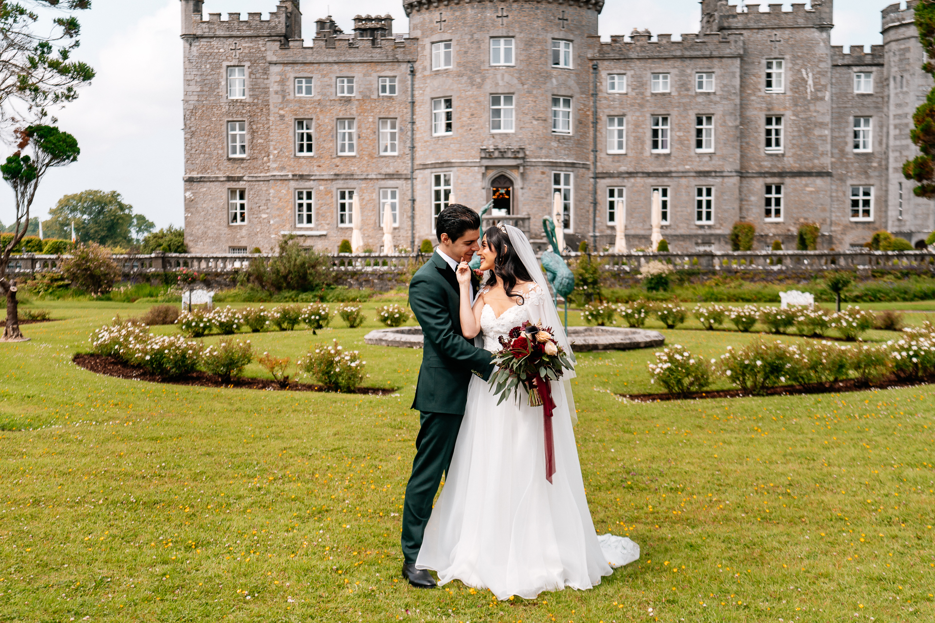 Bride and groom seeing each other for the first time during a first look by the river at Markree Castle