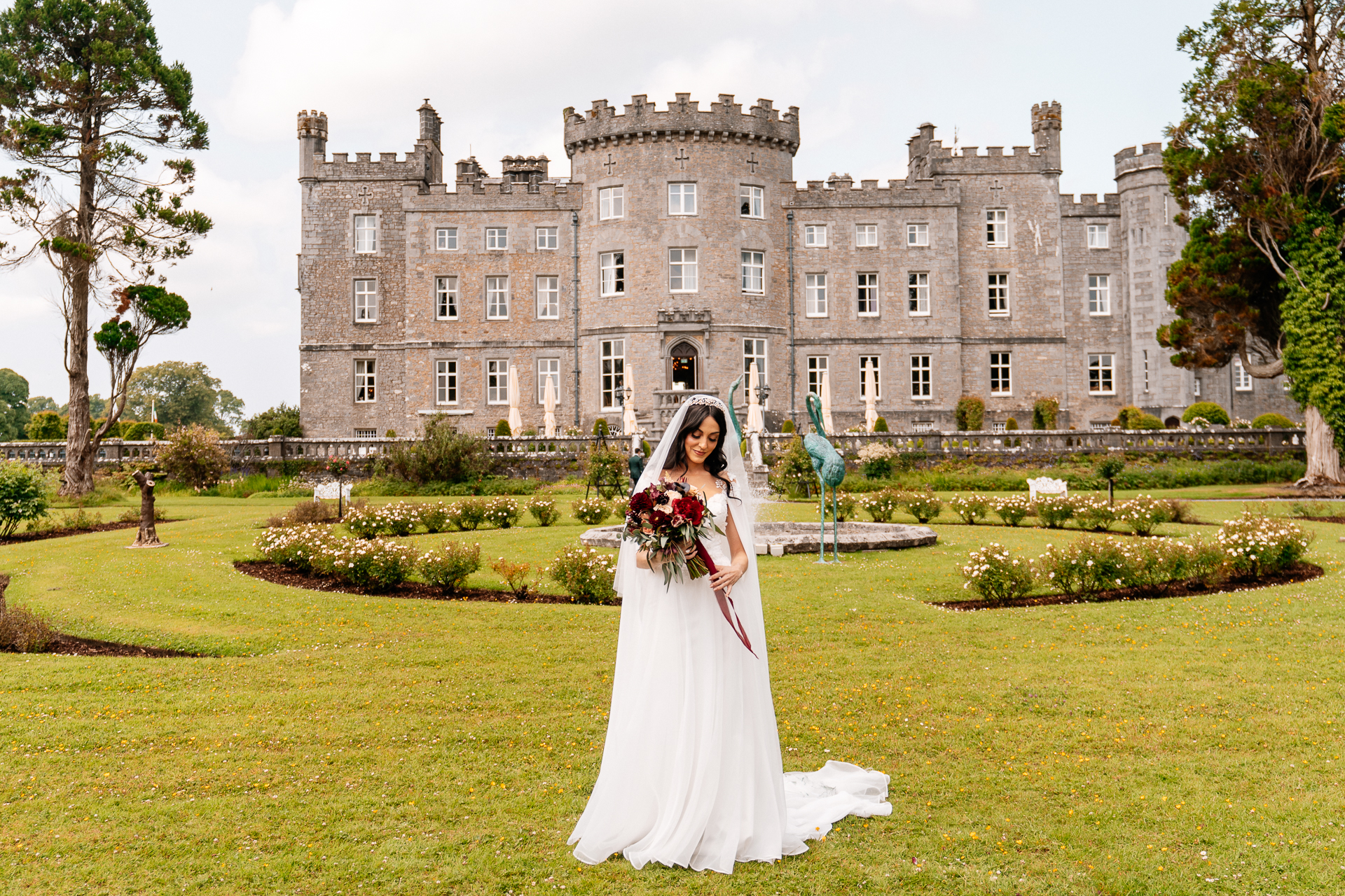 Bride and groom seeing each other for the first time during a first look by the river at Markree Castle