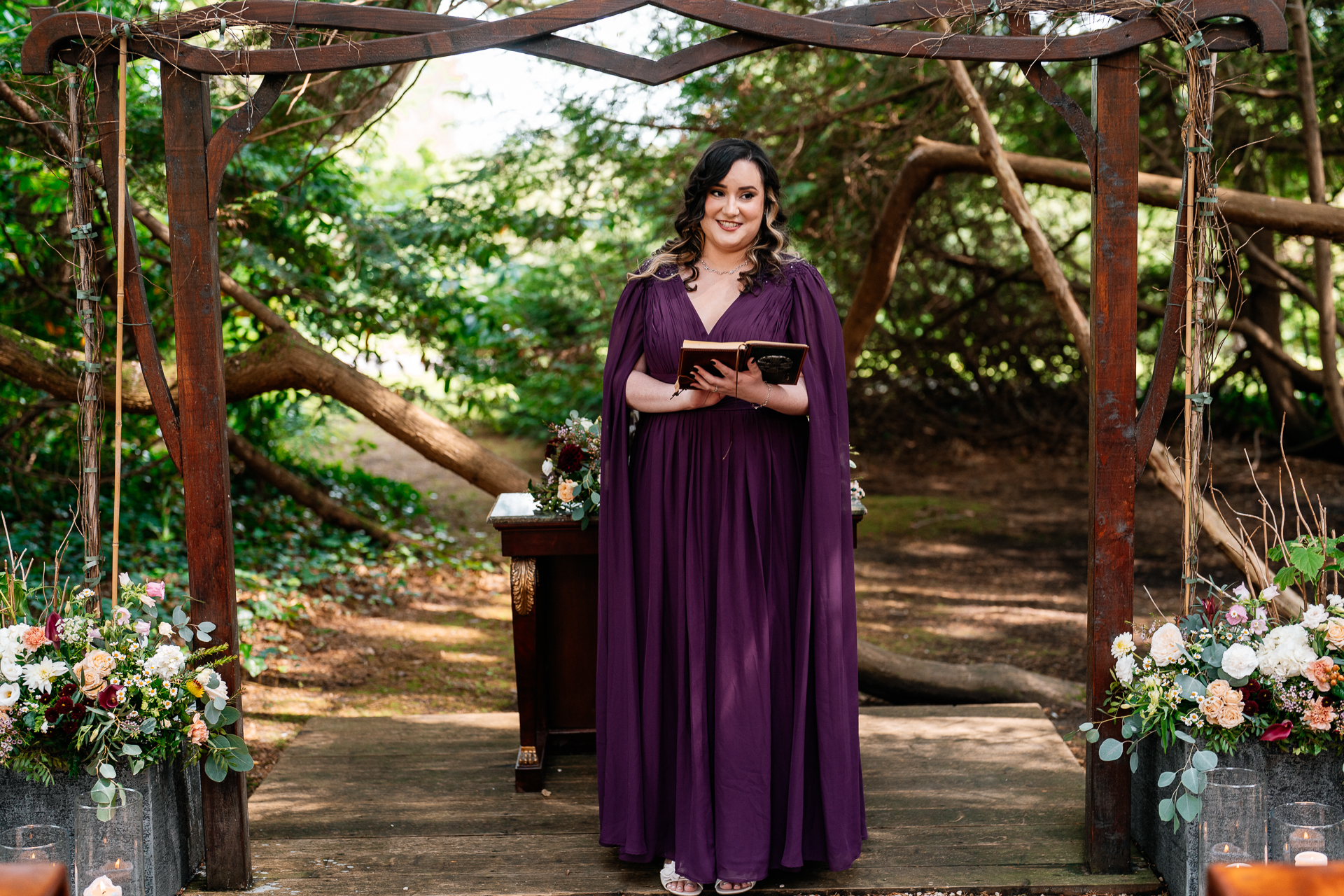 Bride and groom exchanging vows during a woodland ceremony in the forest clearing at Markree Castle