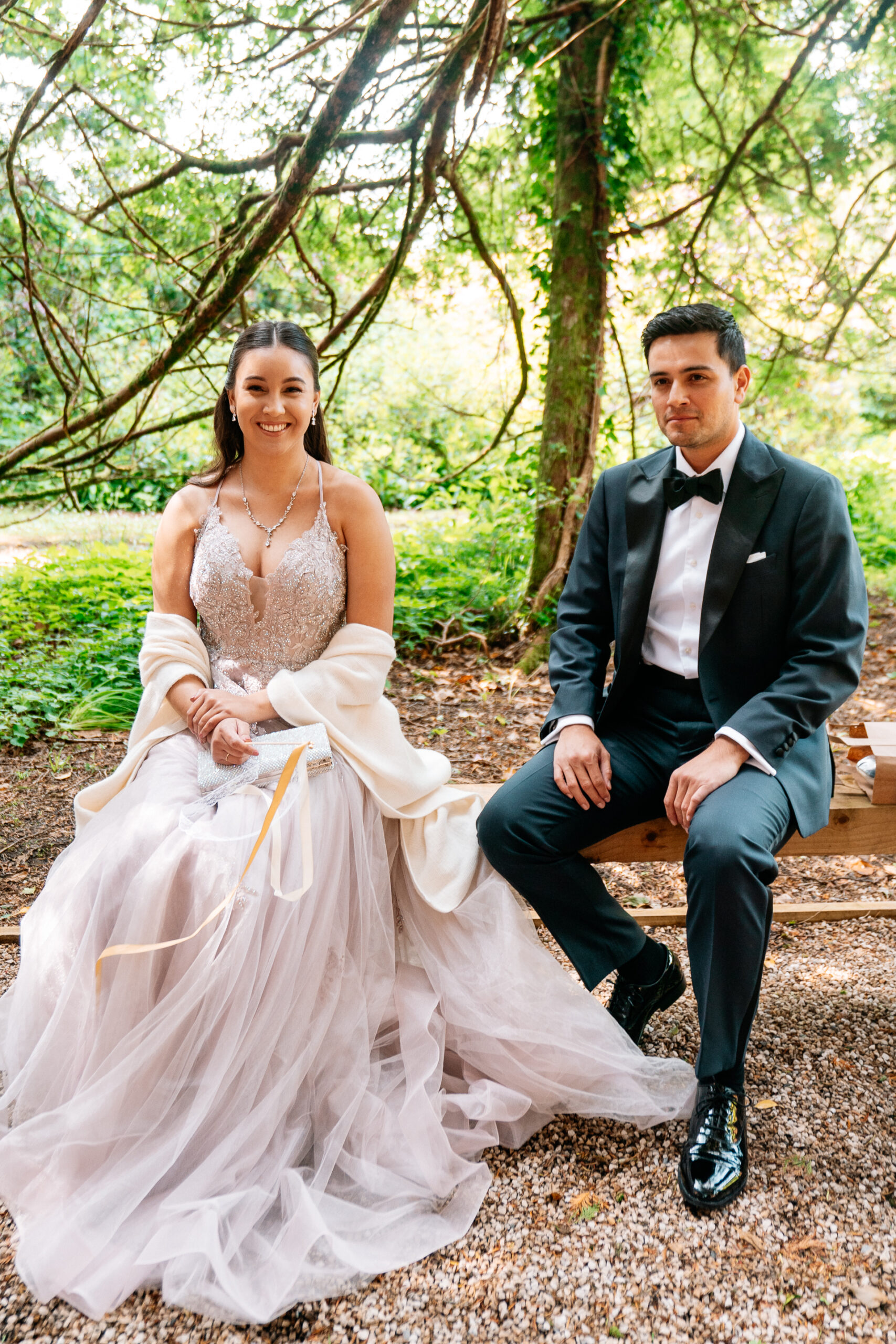 Bride and groom exchanging vows during a woodland ceremony in the forest clearing at Markree Castle