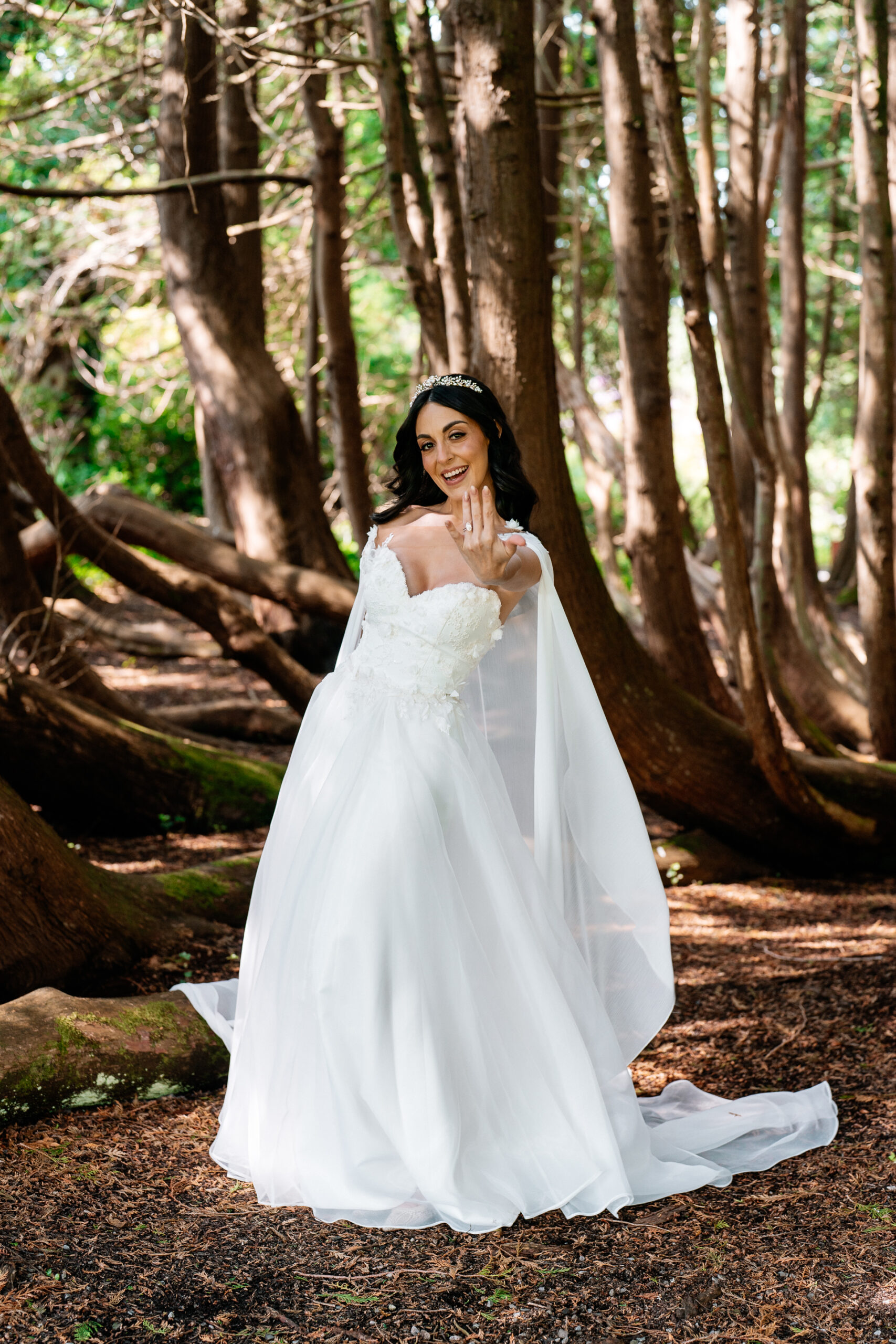 Bride and groom walking through the gardens of Markree Castle during their wedding portrait session