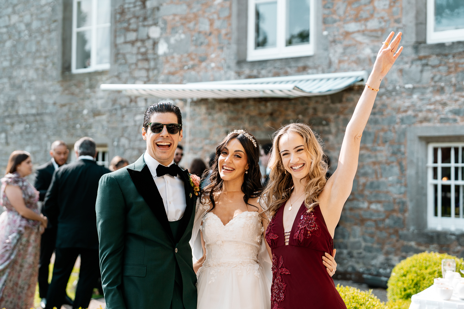 Guests enjoying an outdoor wedding reception on the garden terrace at Markree Castle