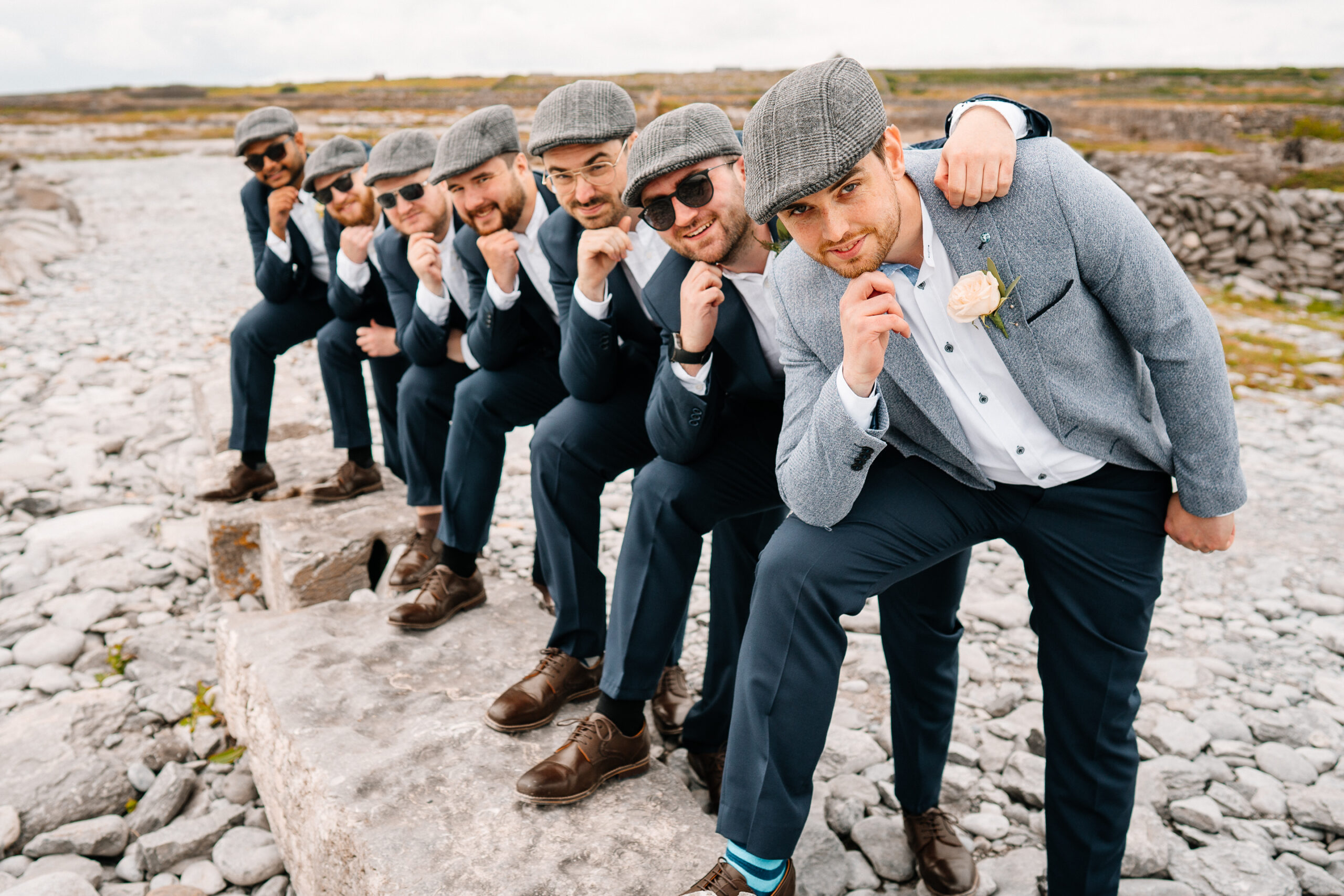 Groomsmen portrait on Inisheer – Aran Islands destination wedding with vintage flat caps