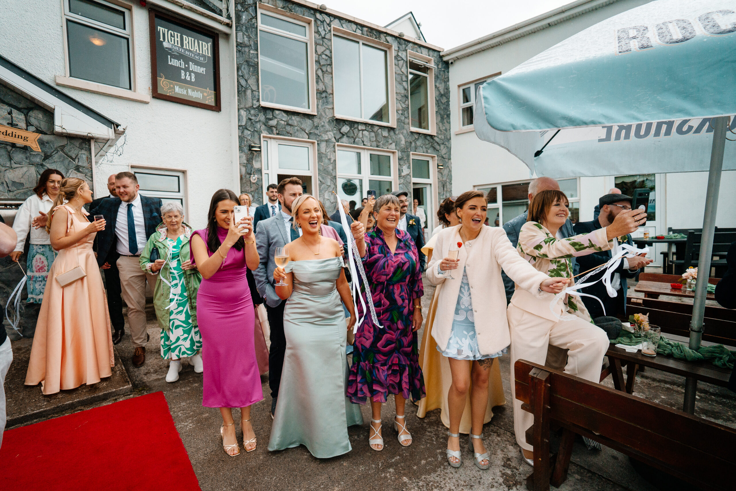 Wedding reception at Tigh Ruairí on Inisheer with guests celebrating in a warm and rustic island setting